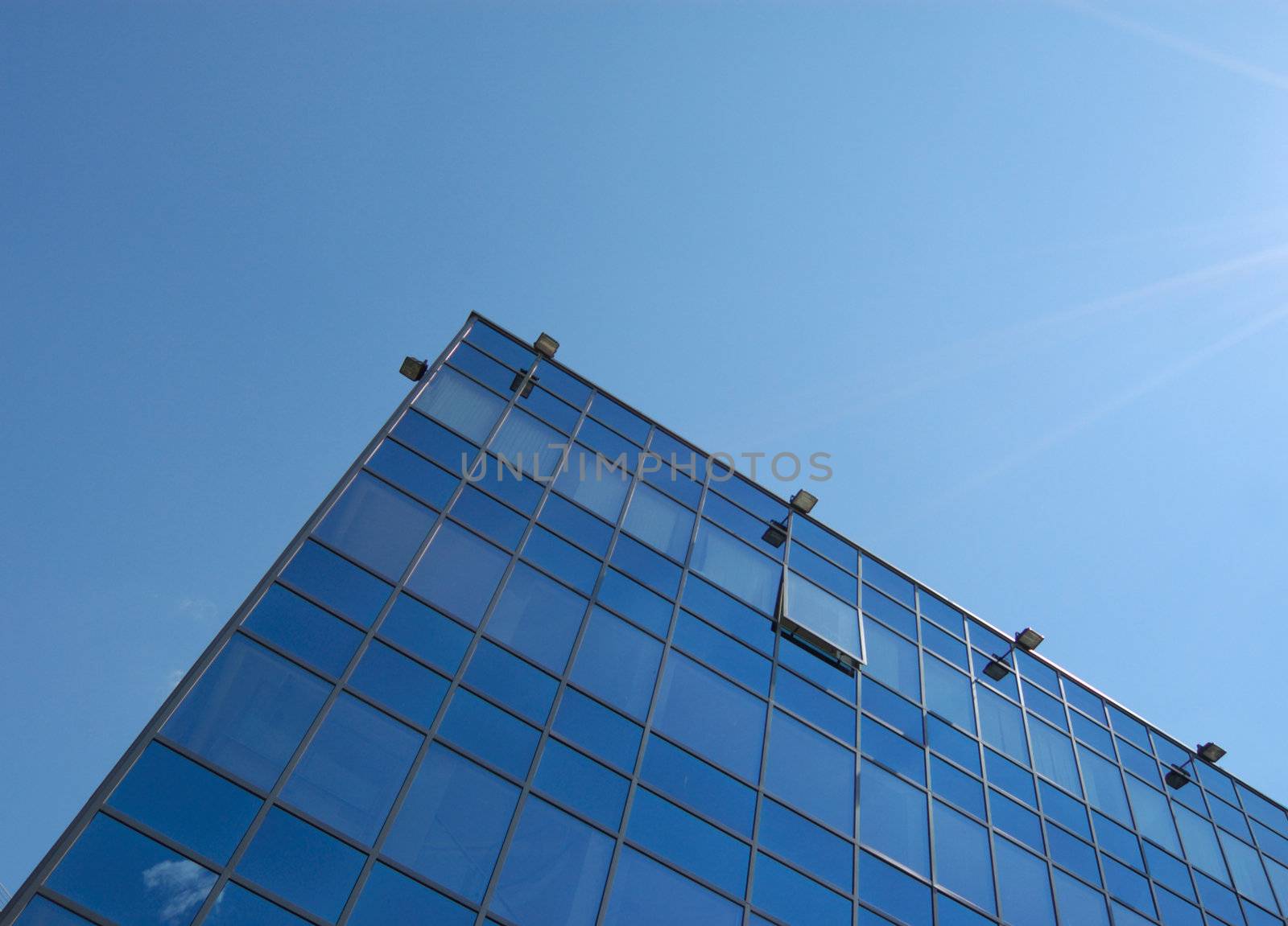 view of new modern office building of "steel and glass"against sky