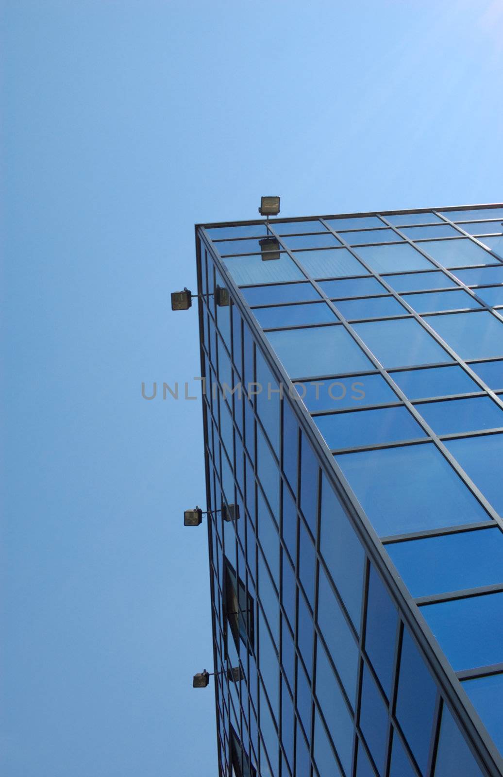 view of new modern office building of "steel and glass"against sky