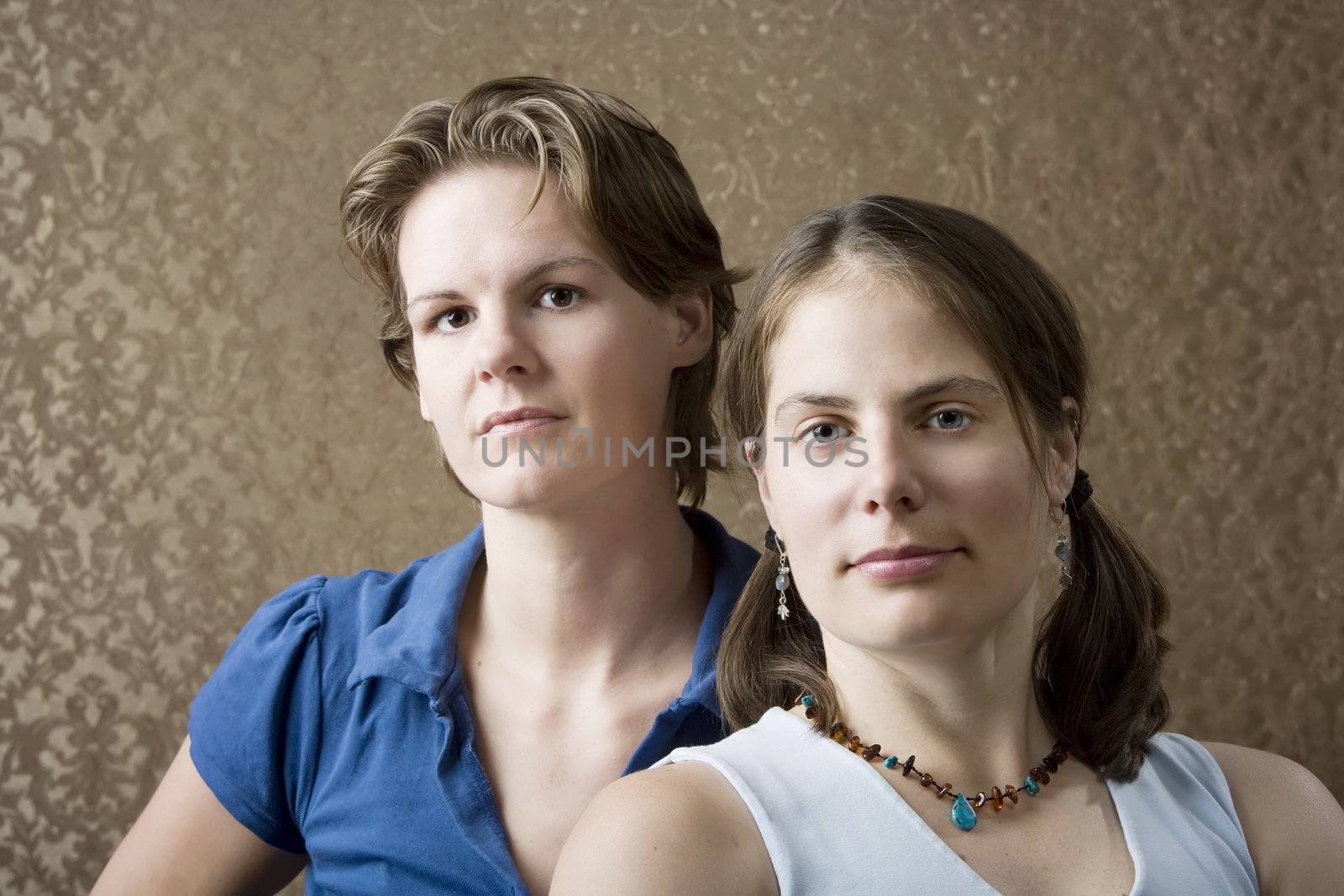 Portrait of Two Pretty Young Women Friends 