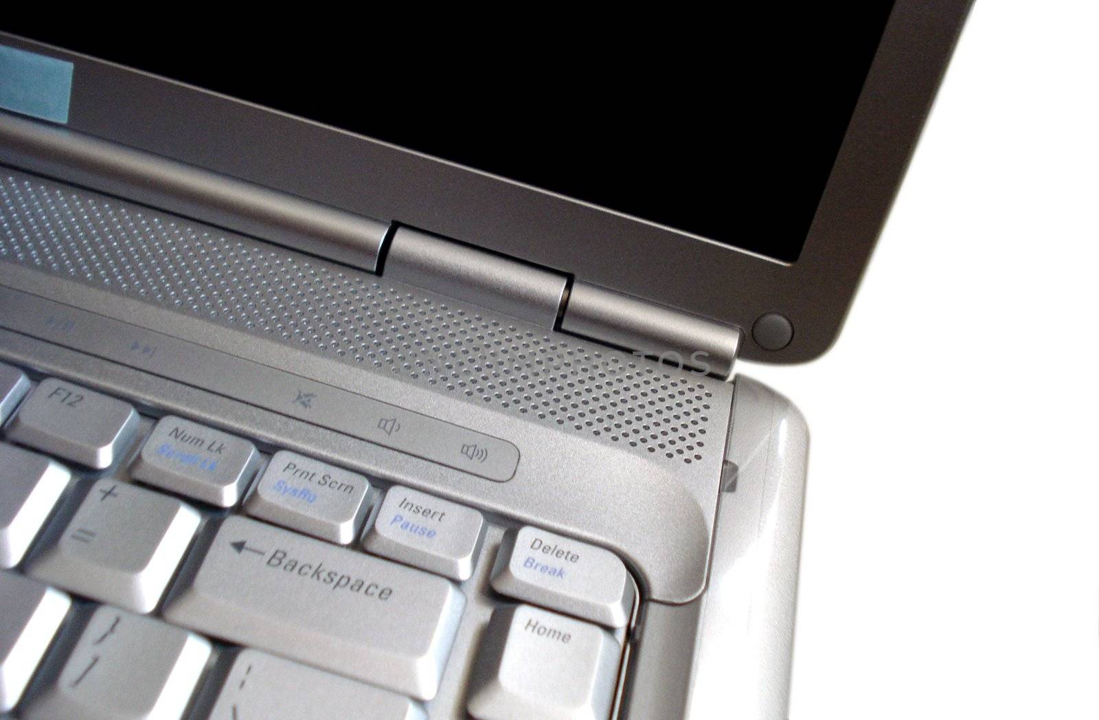 close-up of a silver laptop on a white background