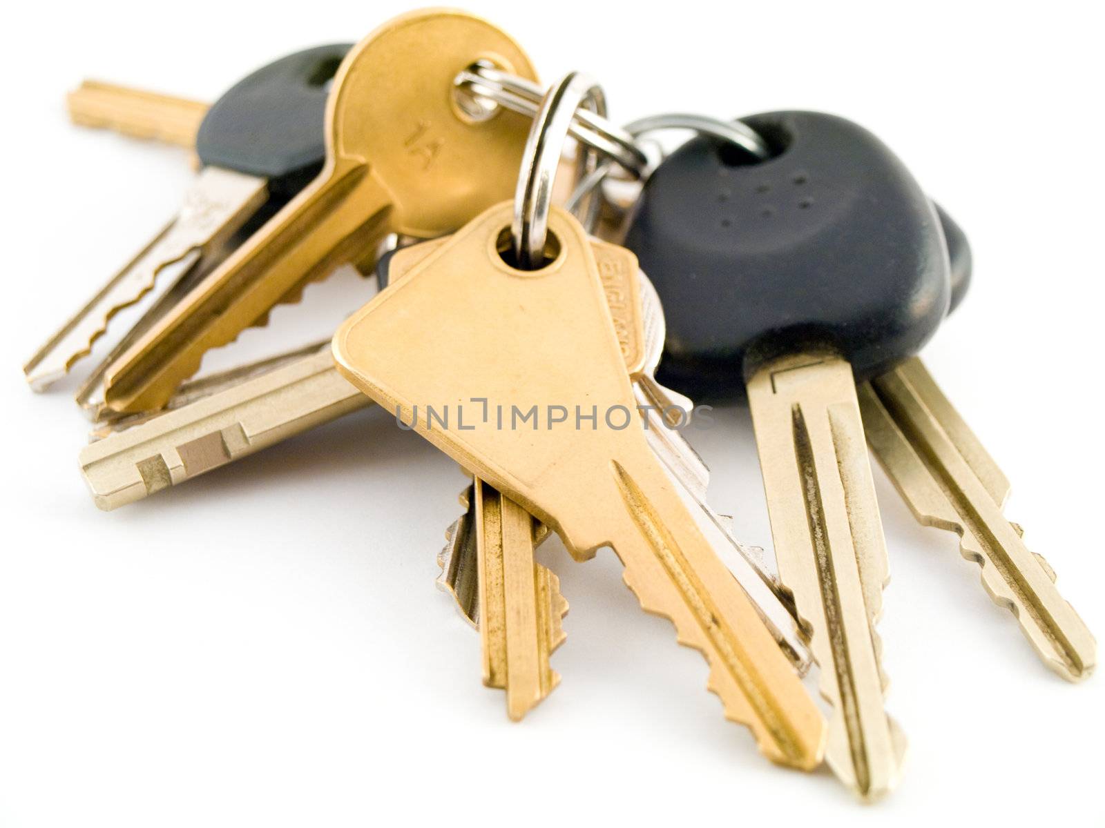 Set of House and Car Keys on White Background by bobbigmac