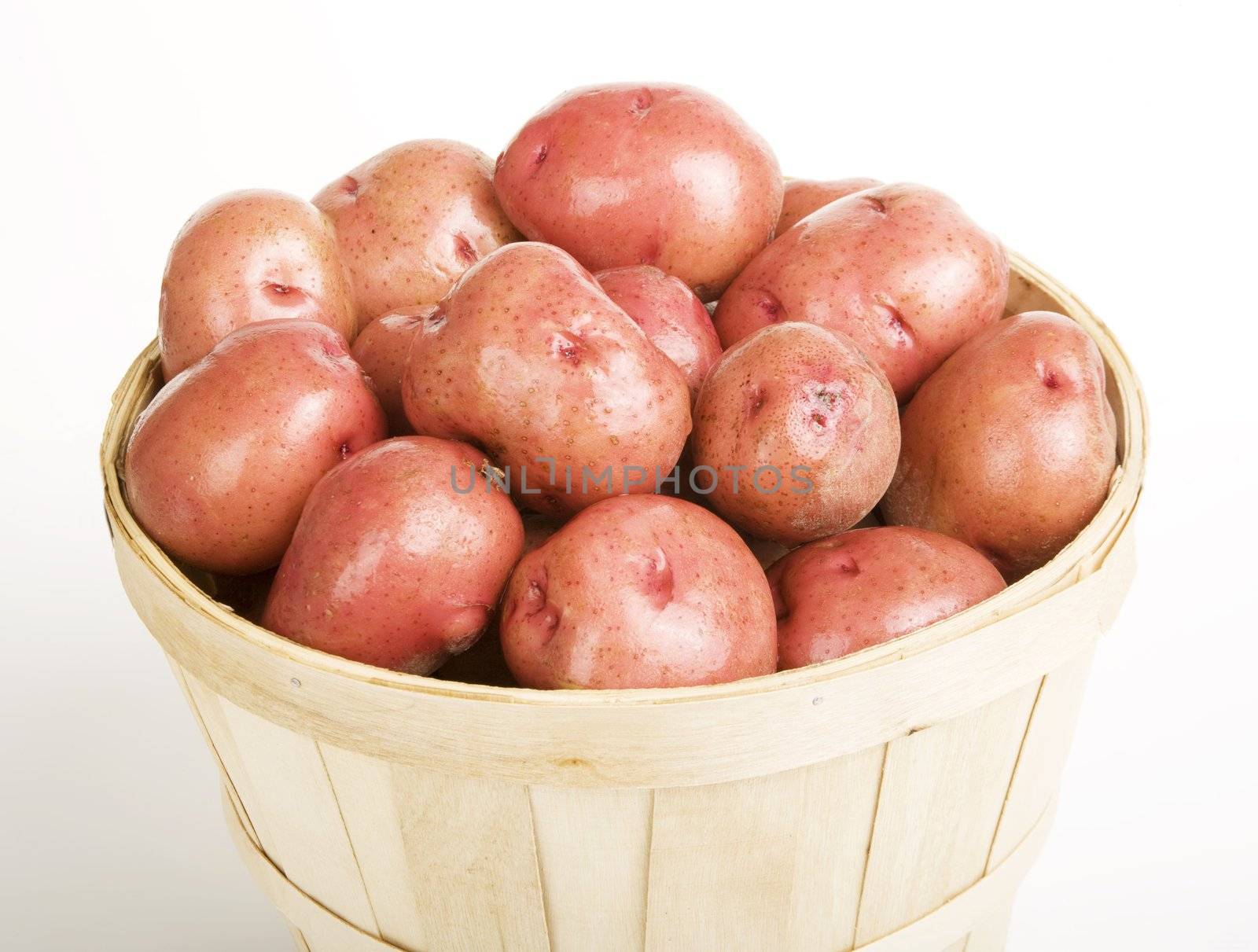 Red Potatoes gathered in a Woven Basket