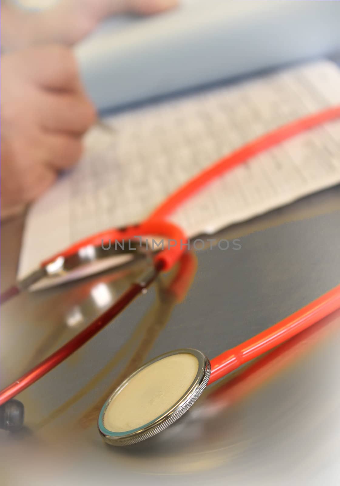 Close up of a red stethoscope, medical image