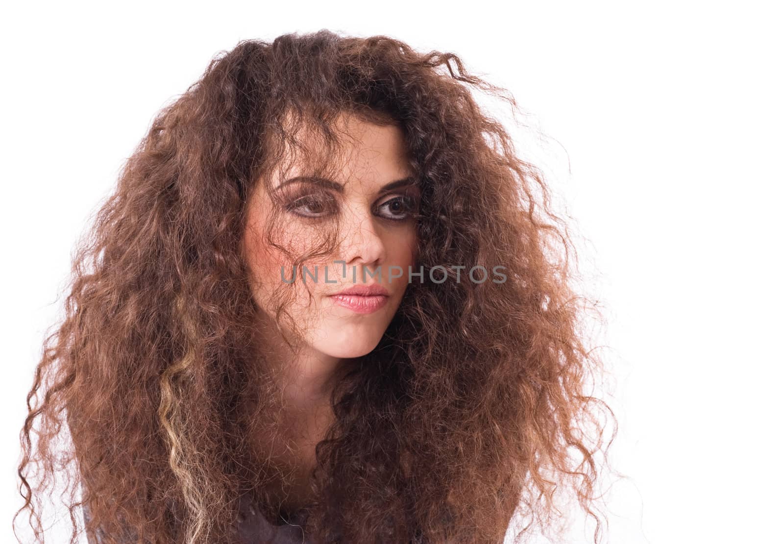 Desponded curly-headed girl portrait isolated over white