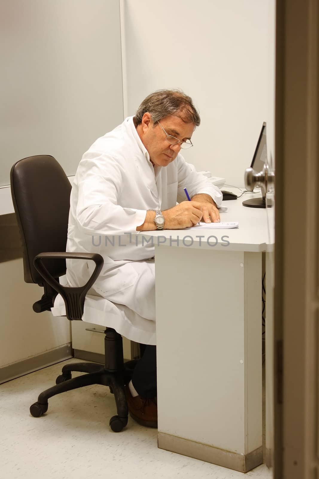 Doctor in his office by Erdosain