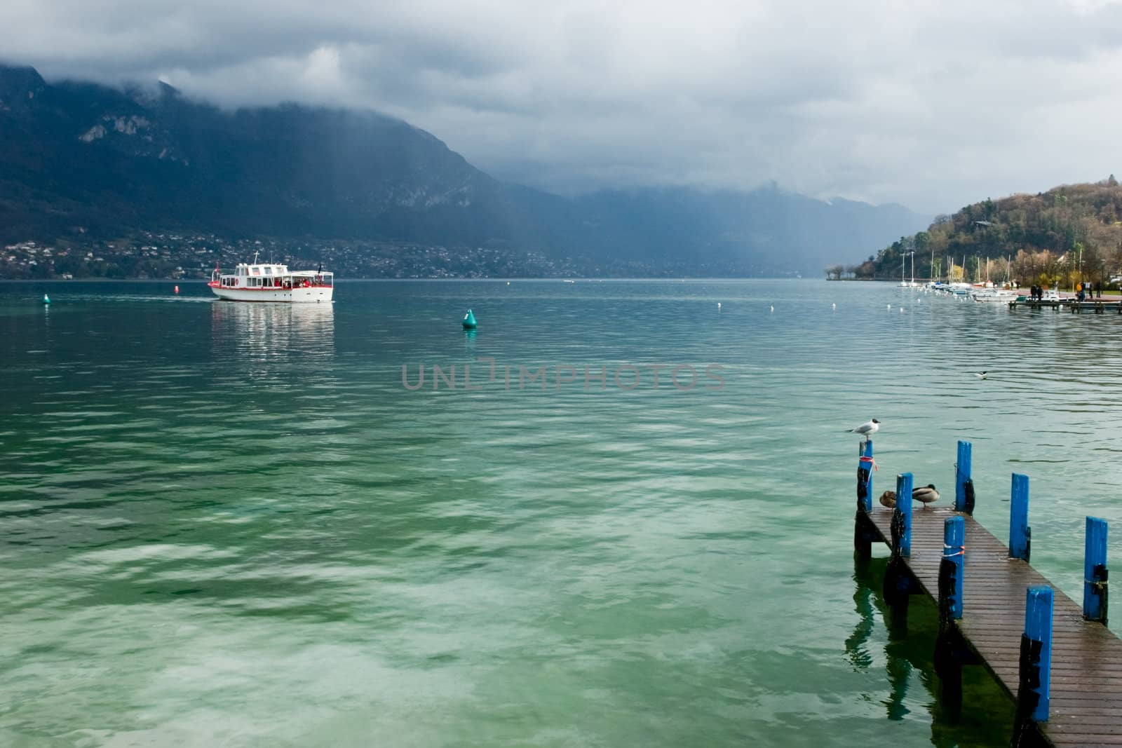 Pleasure boat at the Europe's cleanest Lake Annecy, Haute-Savoie, France