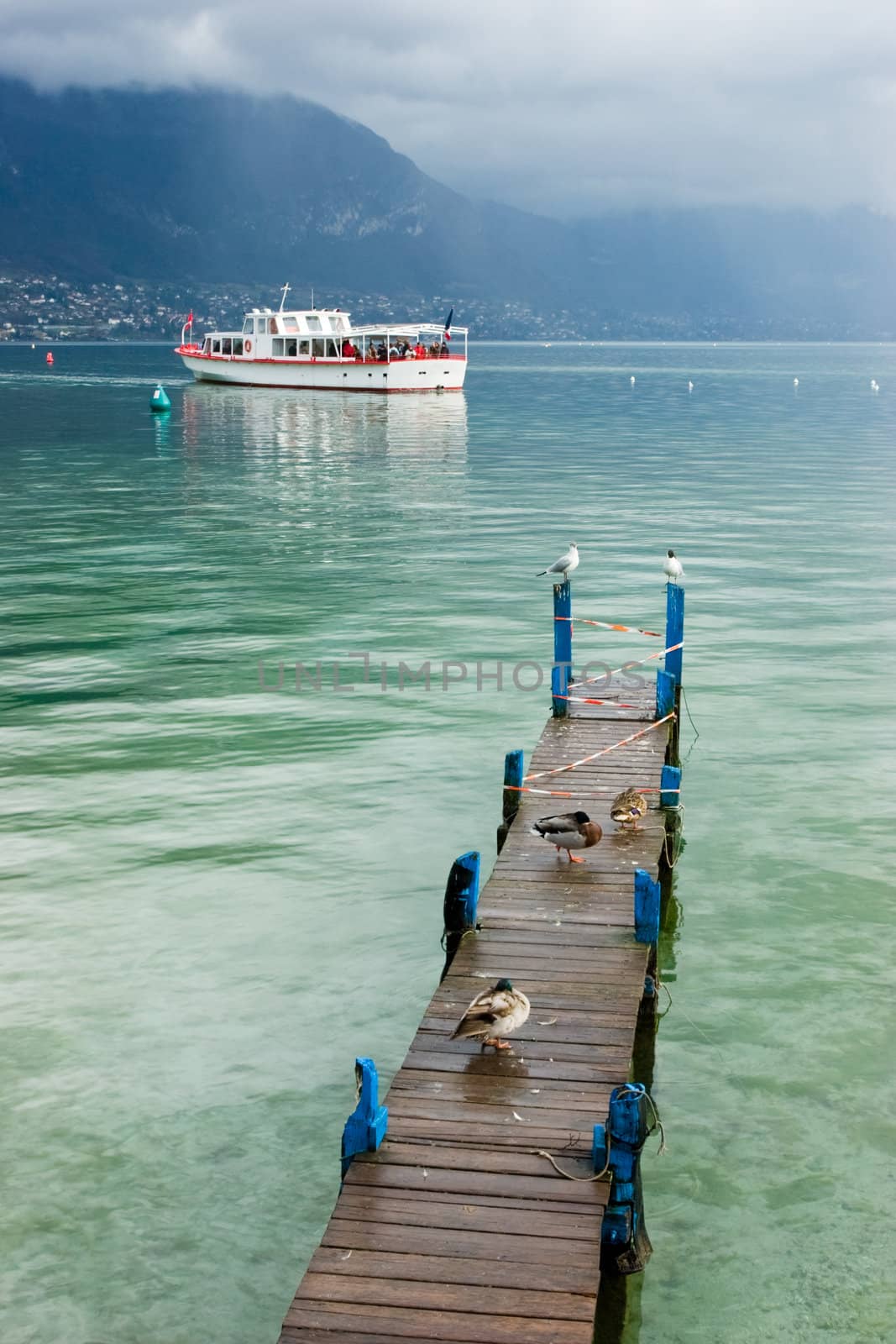 Pleasure boat at the Europe's cleanest Lake Annecy, Haute-Savoie, France