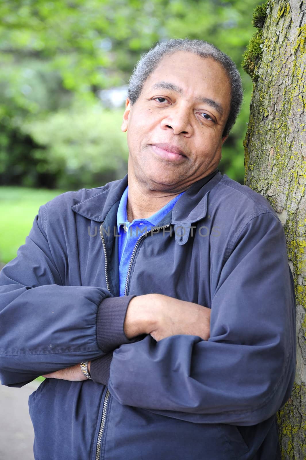 African american man relaxing in the forest.