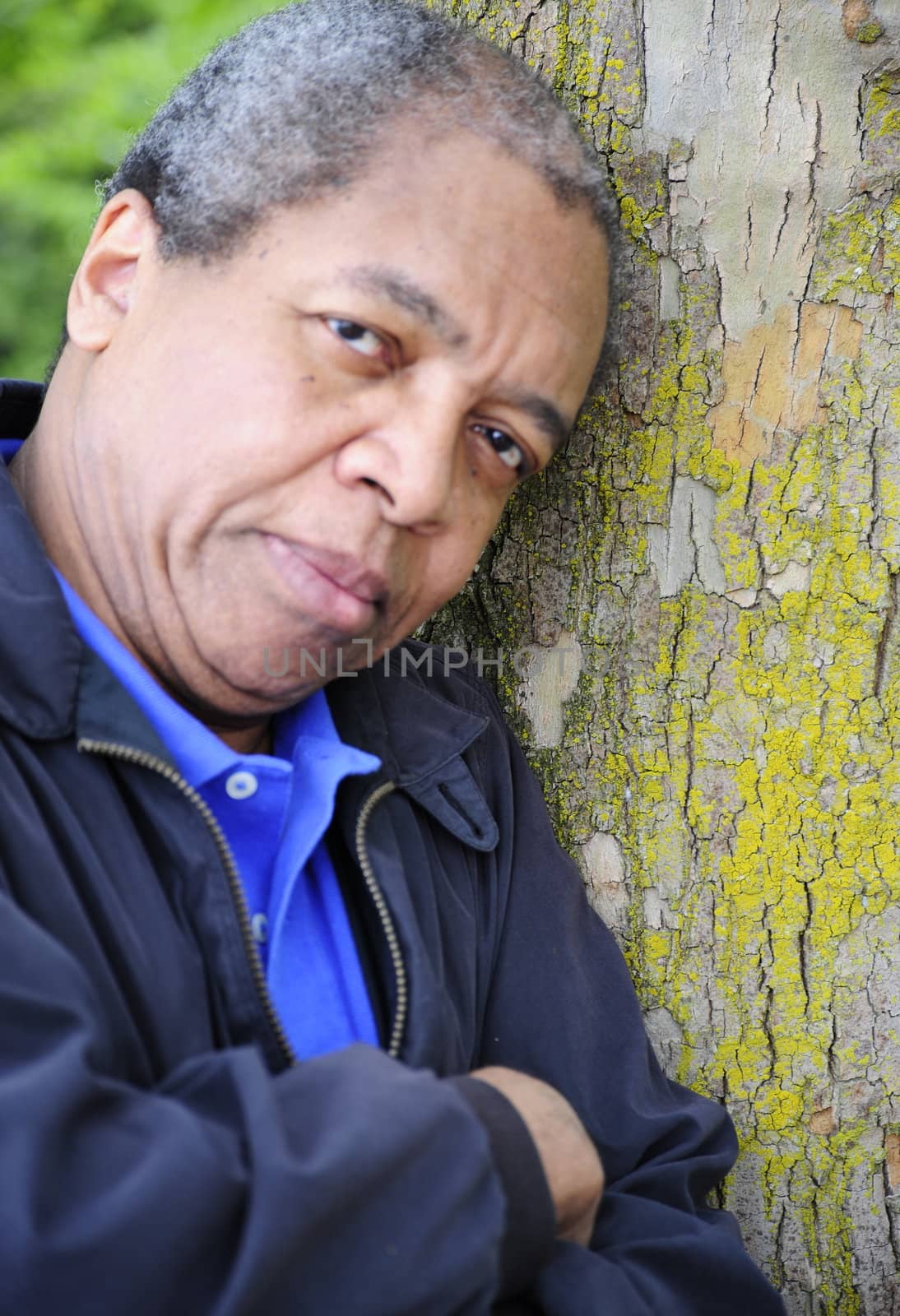 African american man relaxing in the woods.