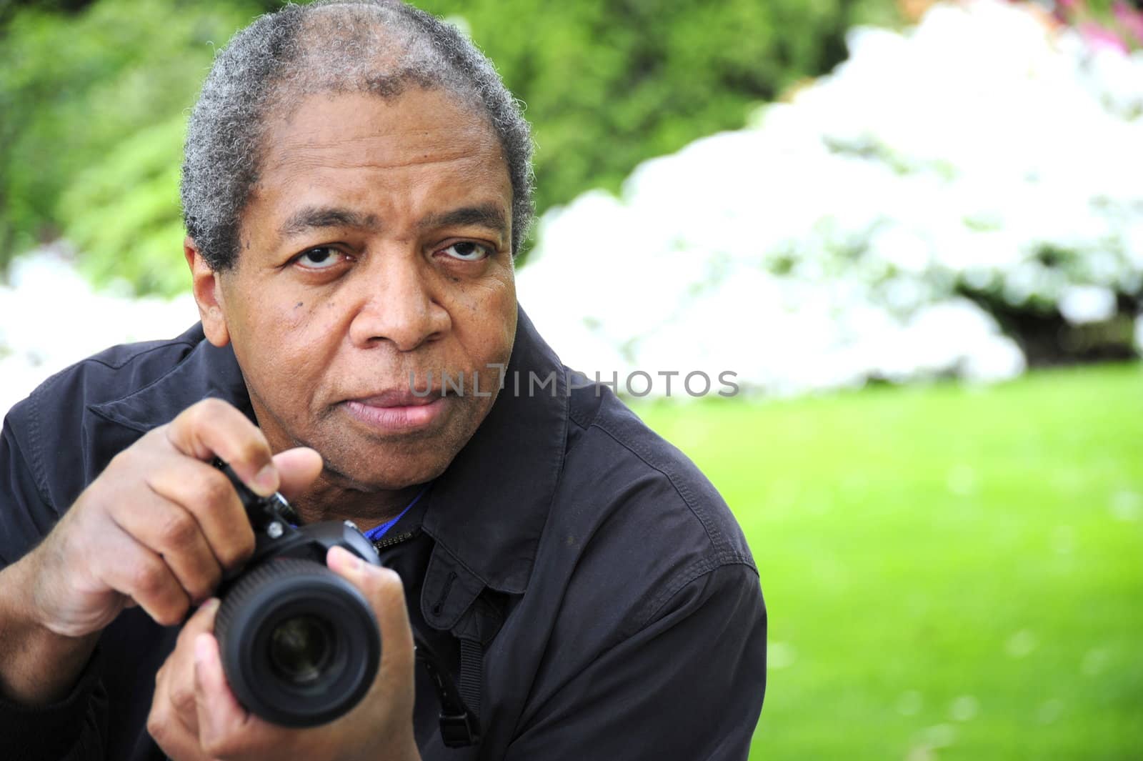 African american photographer on assignment.