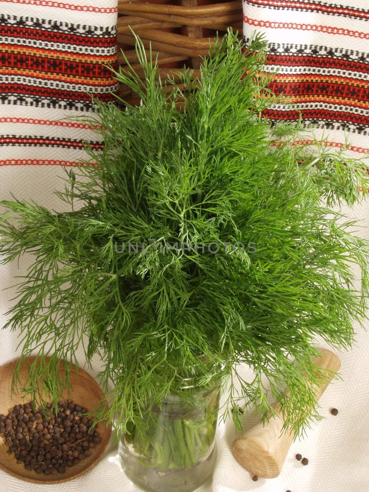 Fennel a bunch in a composition with fragrant pepper and the Ukrainian national towels
