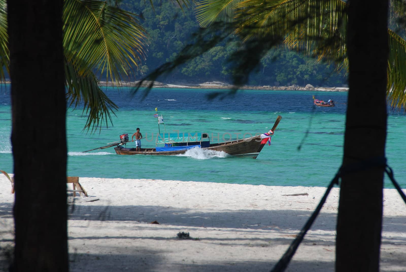 Longtail boat in tropical waters