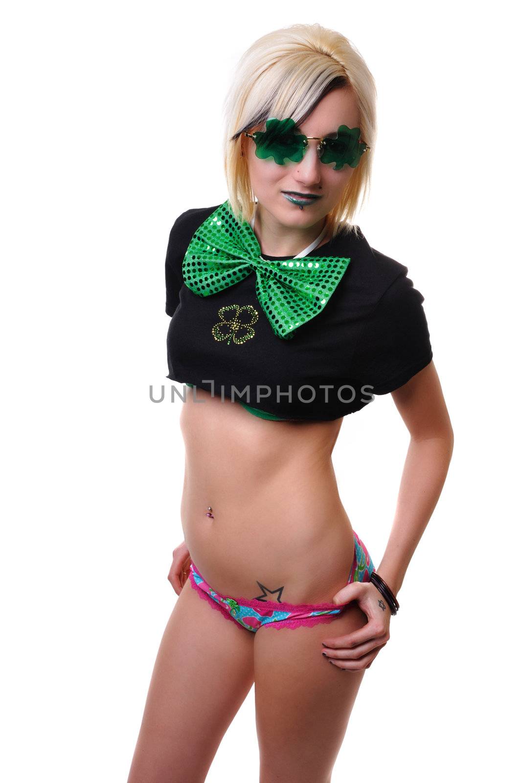 a woman in green with shamrock glasses for st patty's day