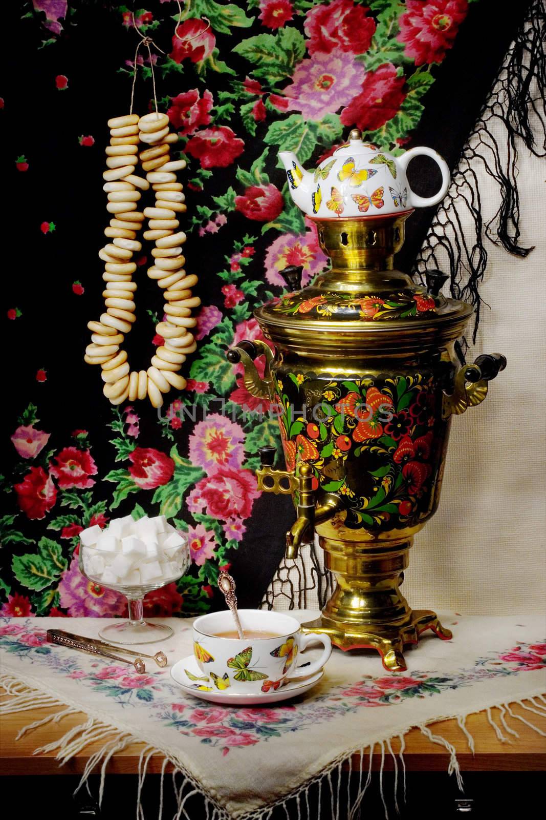 Still-life with a samovar and steering-wheels