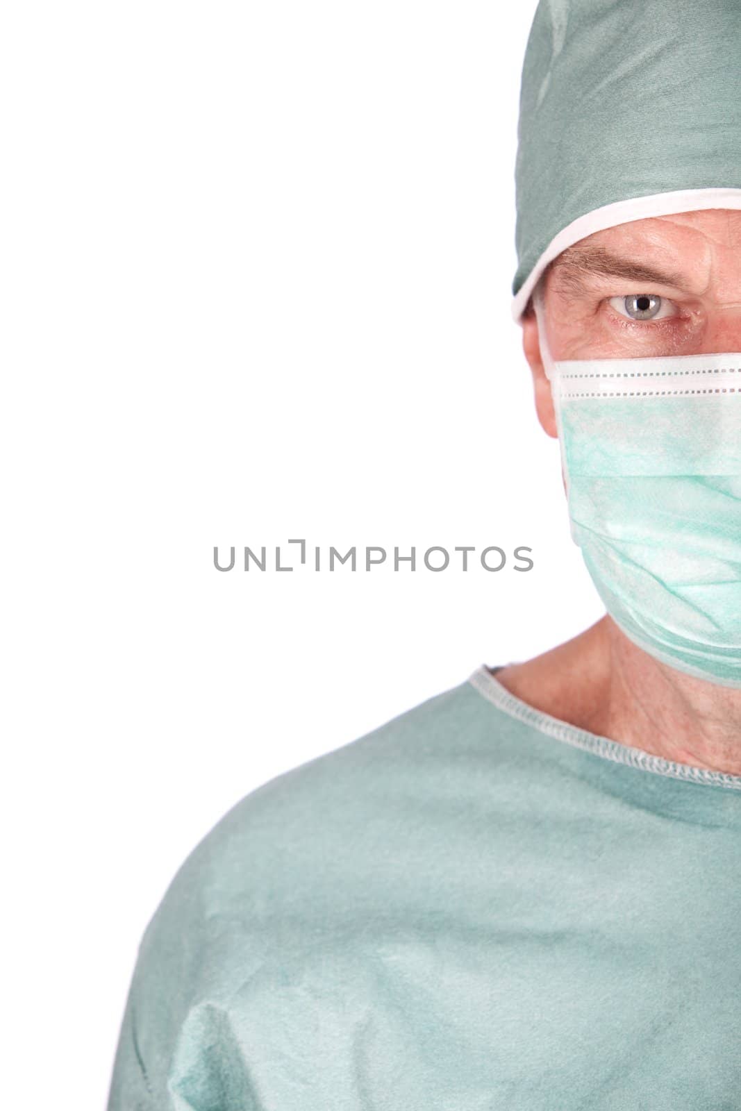 A 60 year old surgeon isolated on a white background.