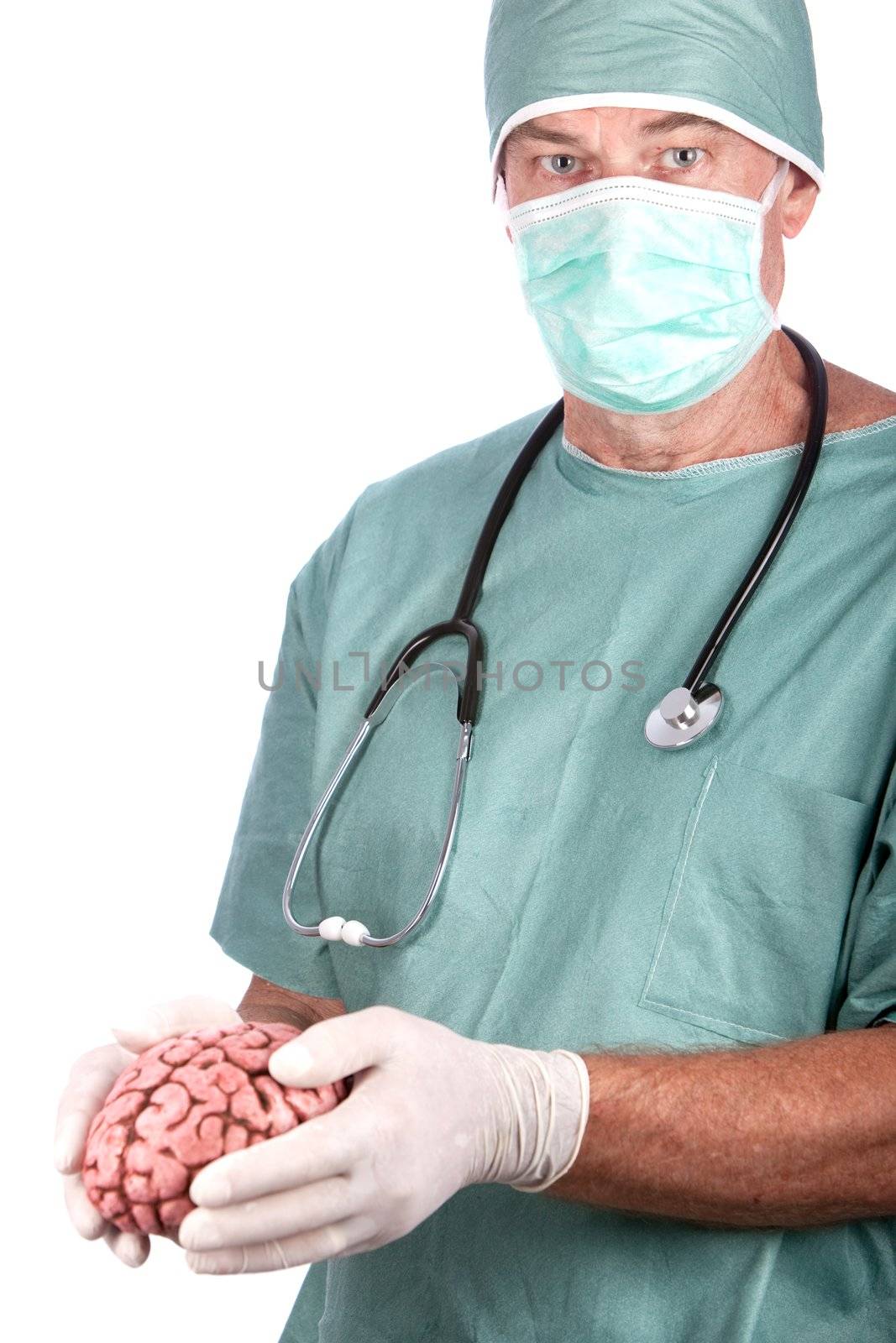A 60 year old surgeon holding a brain, isolated on a white background.