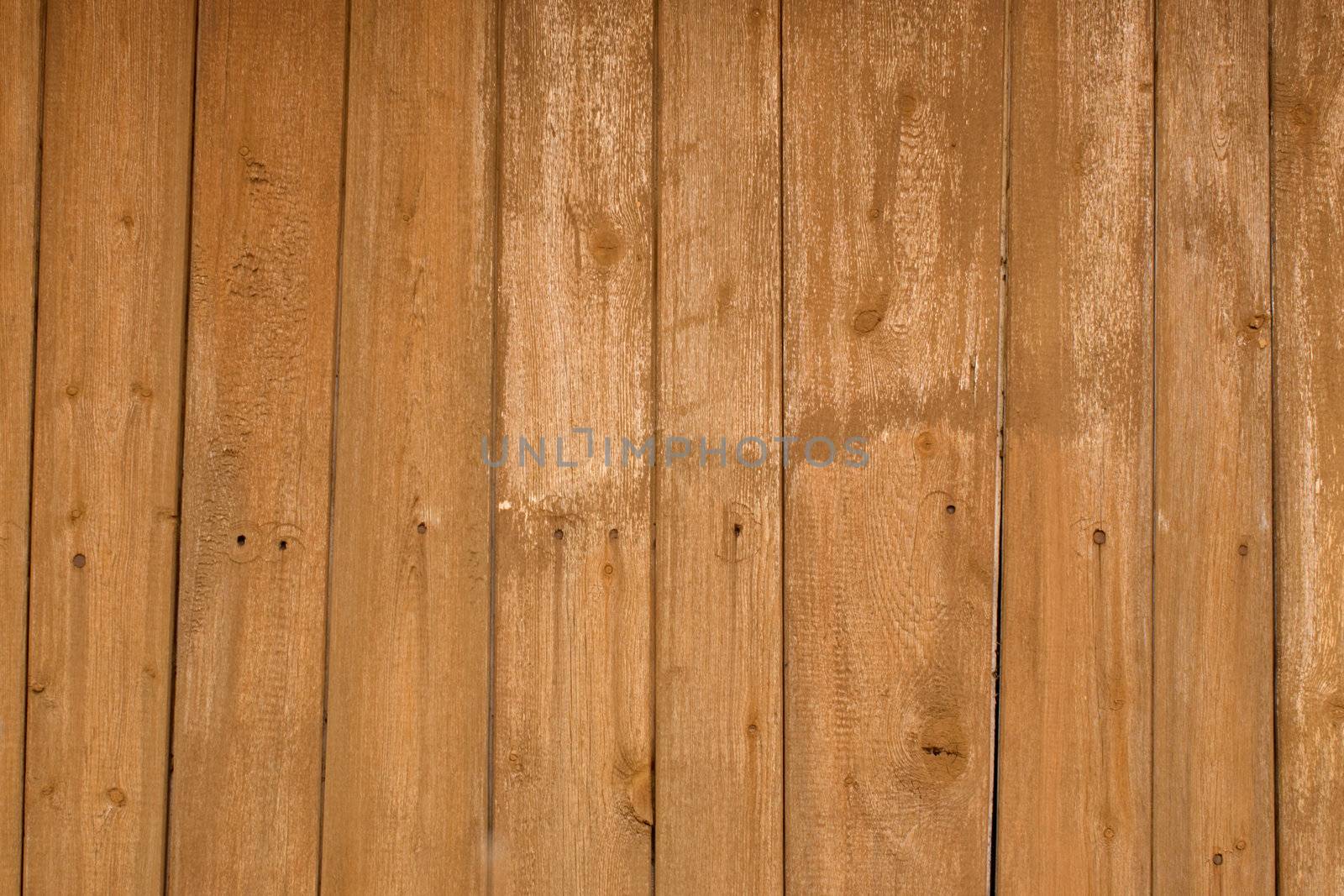 Wooden wall of yellow color