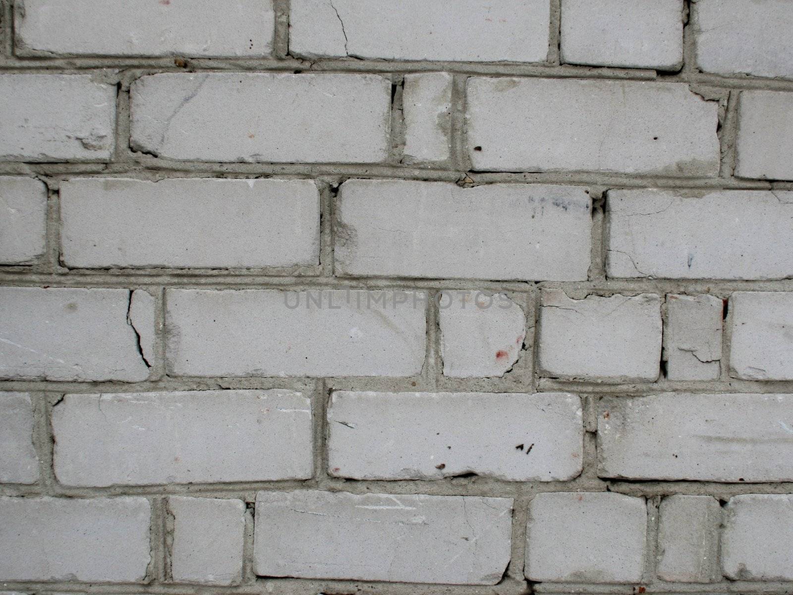 Old brick wall of white color