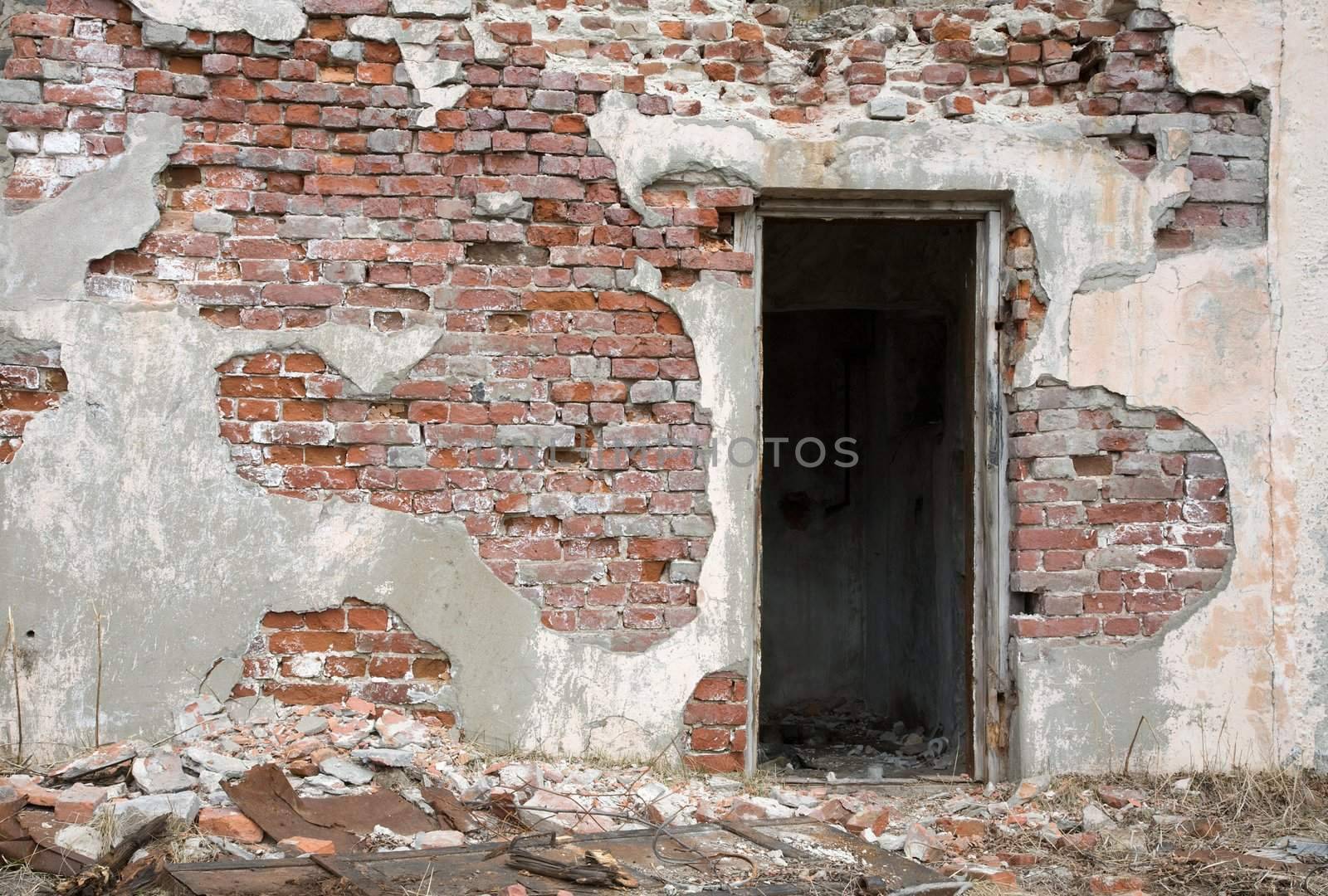 Old red brick wall background with door