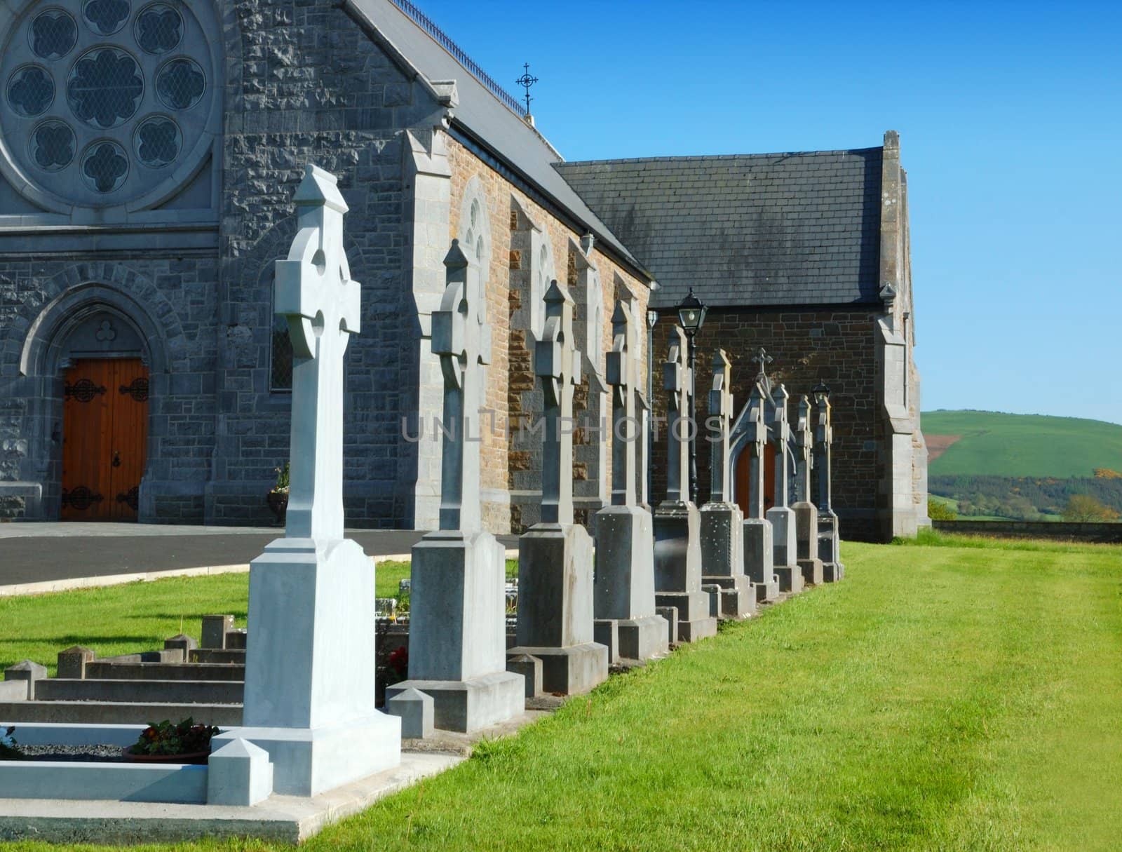 catholic church and graveyard by maggiemolloy