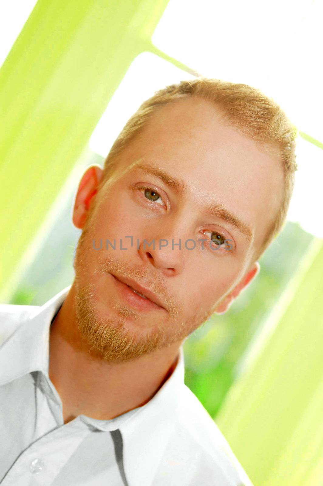 young blonde man in white shirt by maggiemolloy