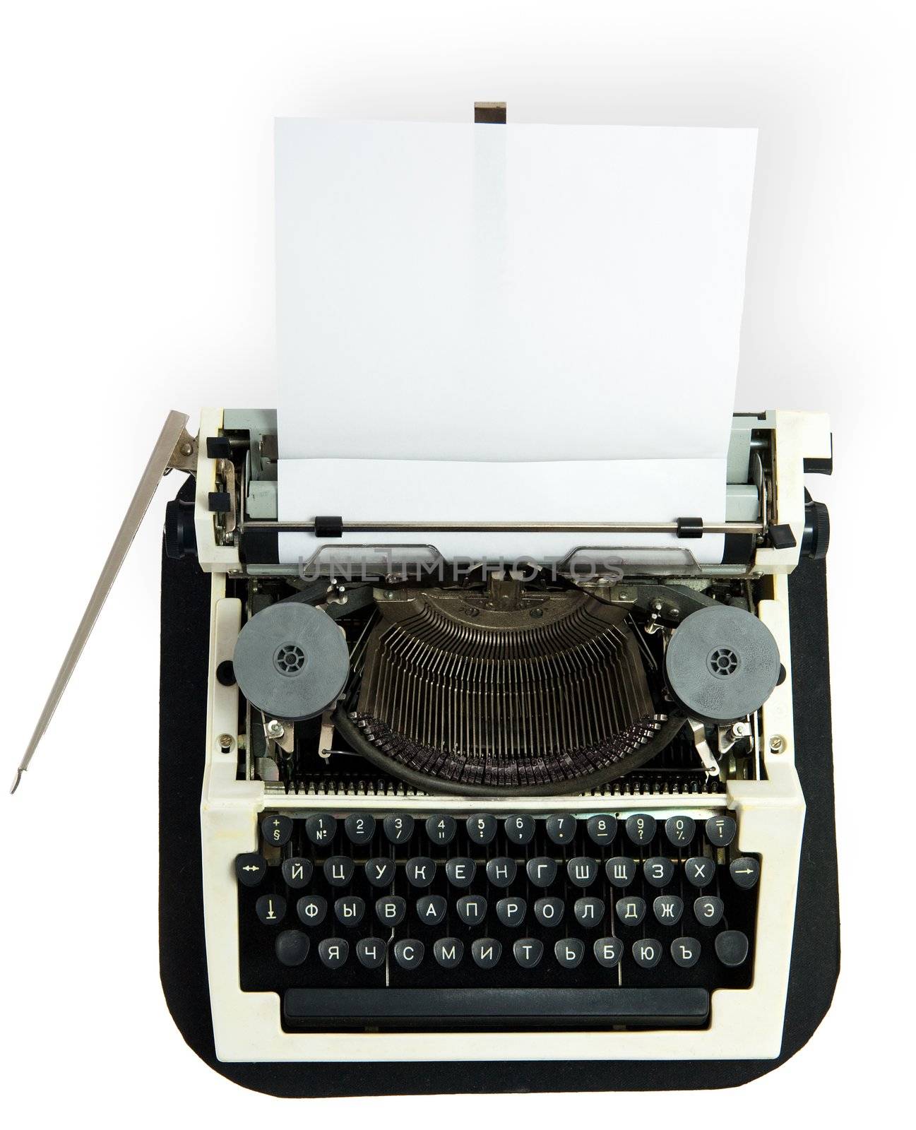 Typewriter with the inserted leaf of a paper in the carriage