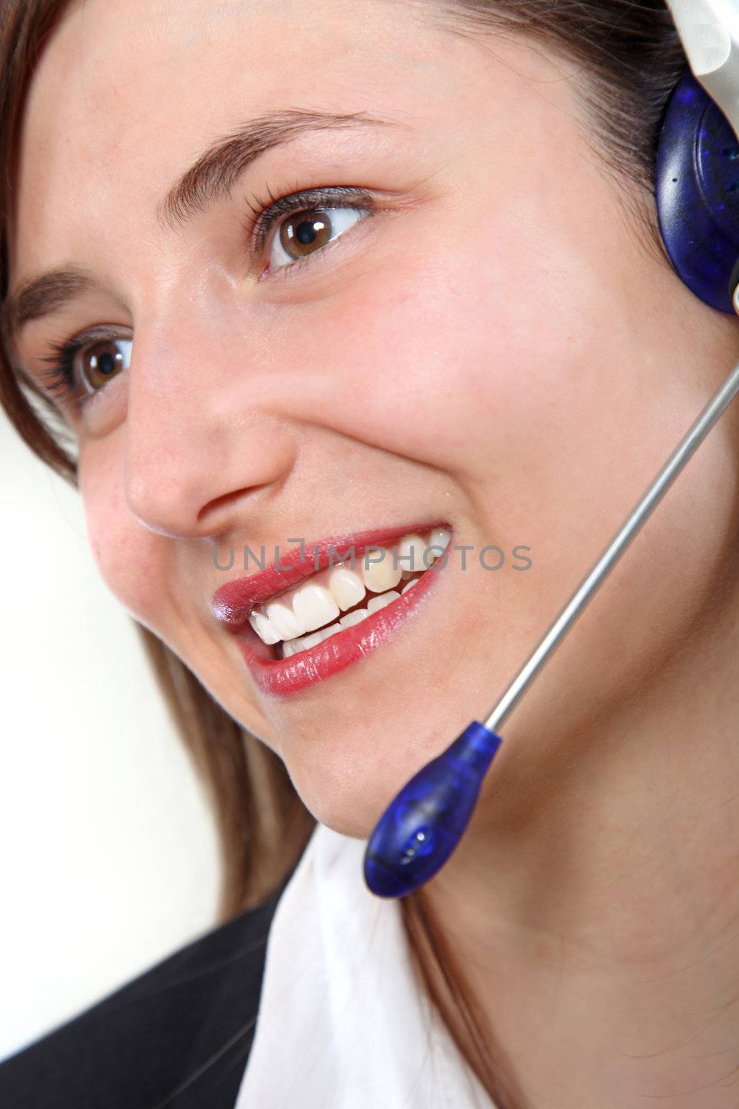 Young, friendly woman in the call center by Farina6000