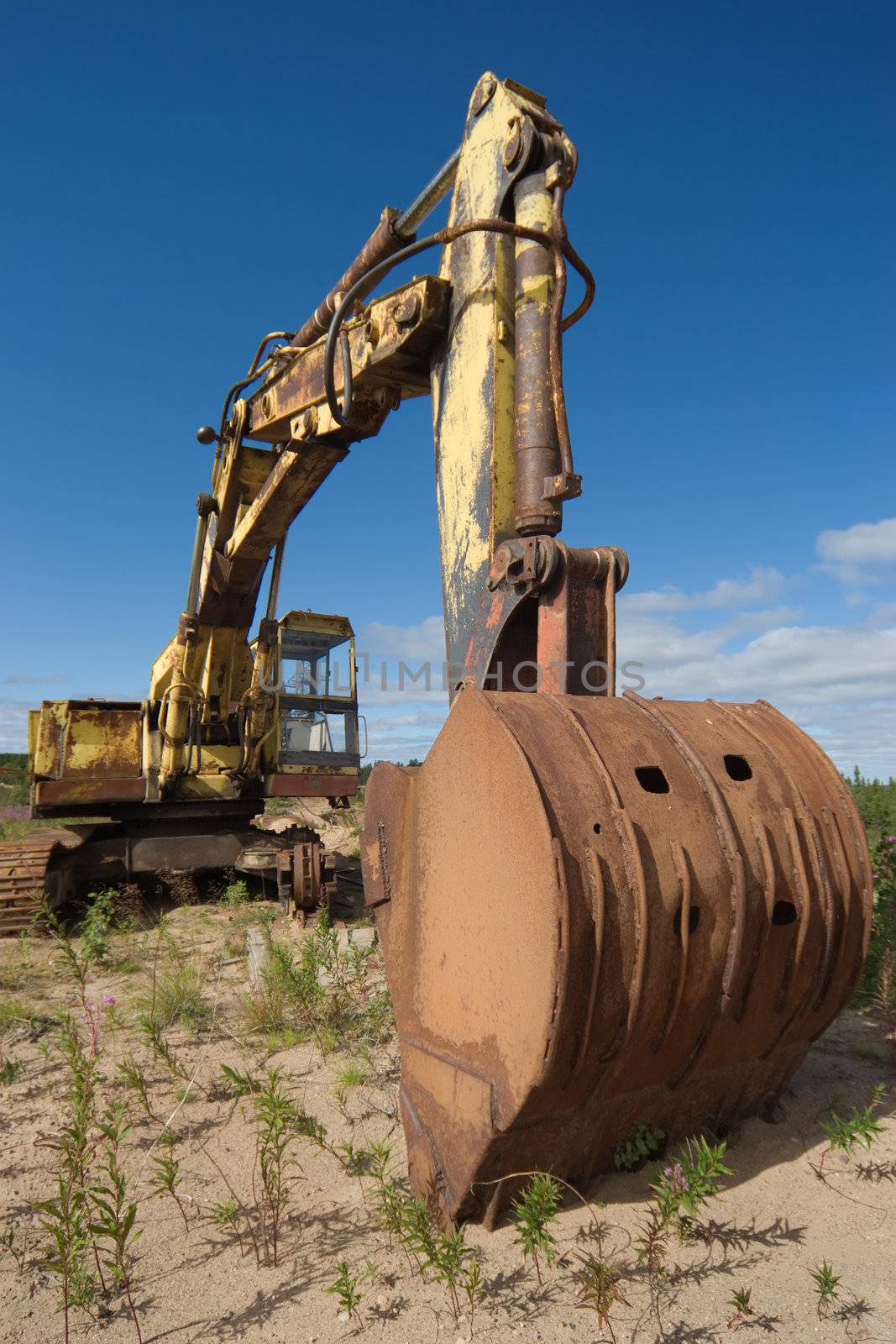 Old destruction rusty excavator