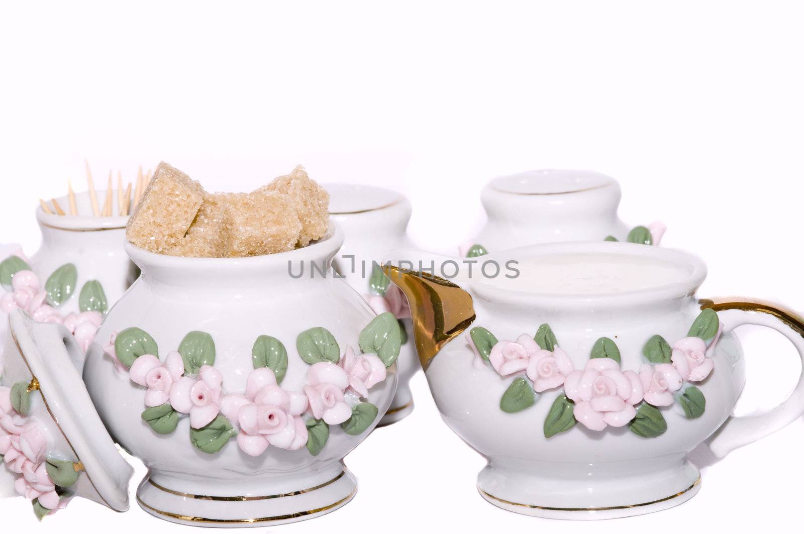 close-up on a tea set, isolated on white