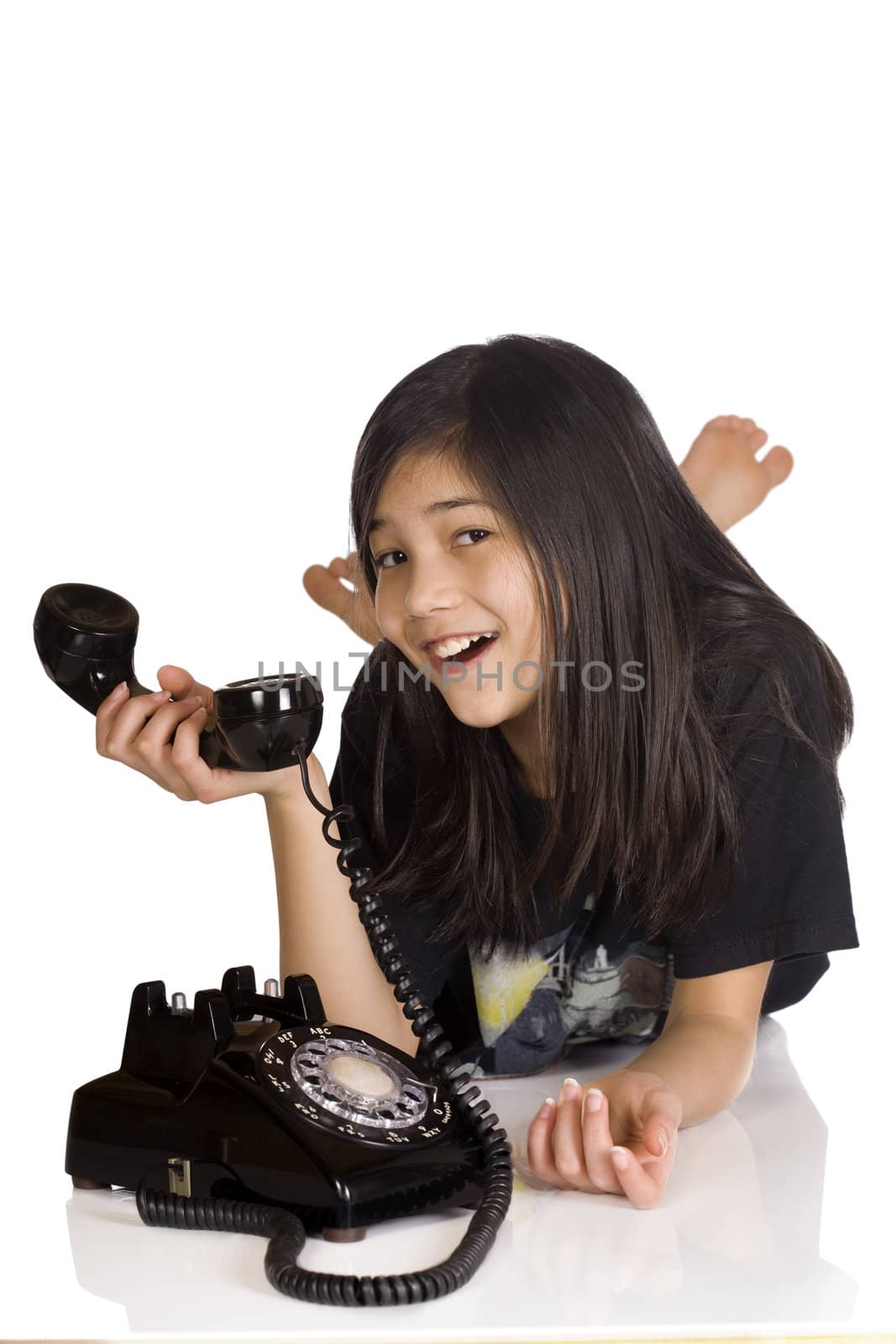 Girl holding old rotary phone