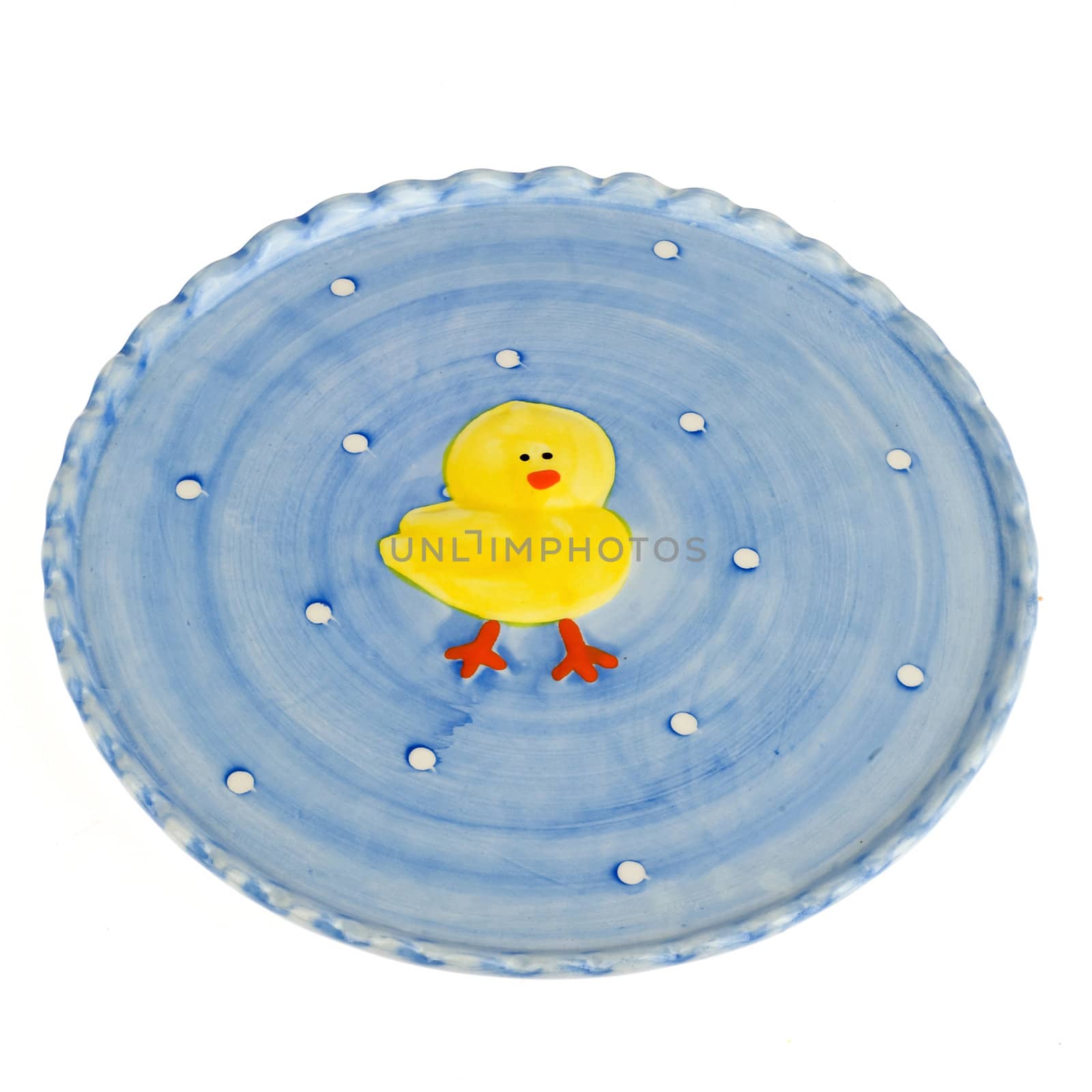 a blue plate with a yellow chicken for easter