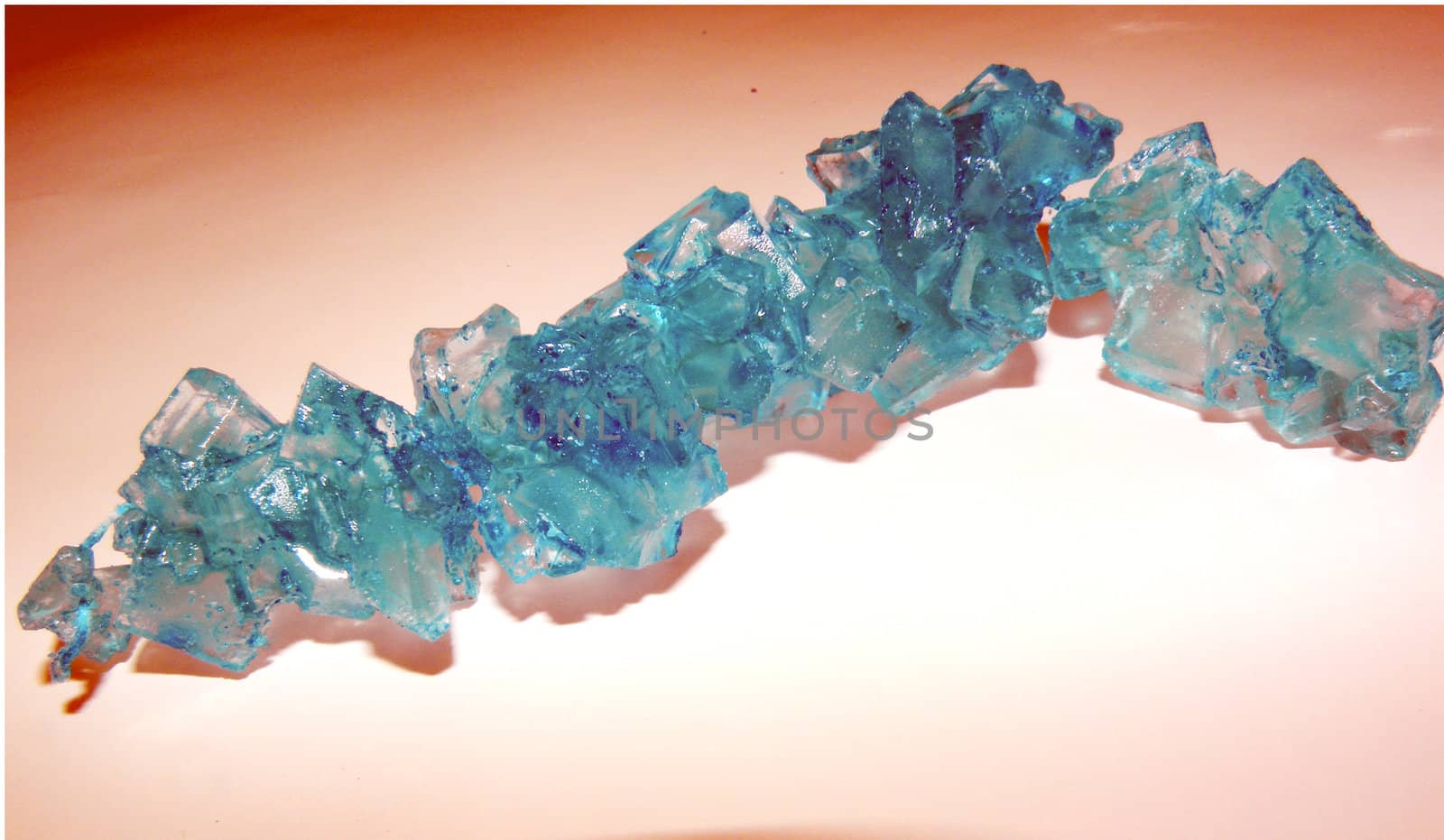 a stricng of teal/ turqoise rock candy.