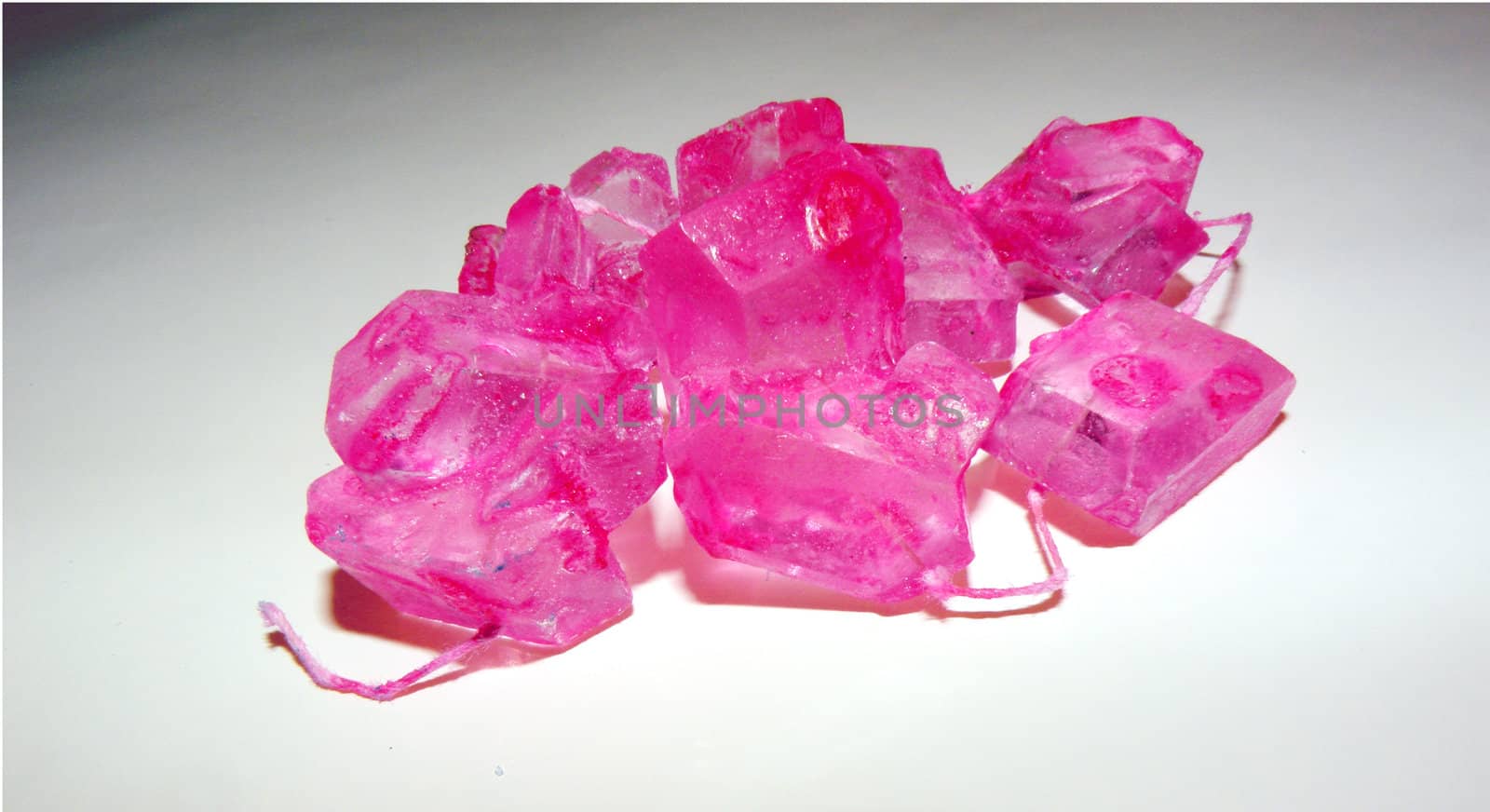 a string of pink rock candy