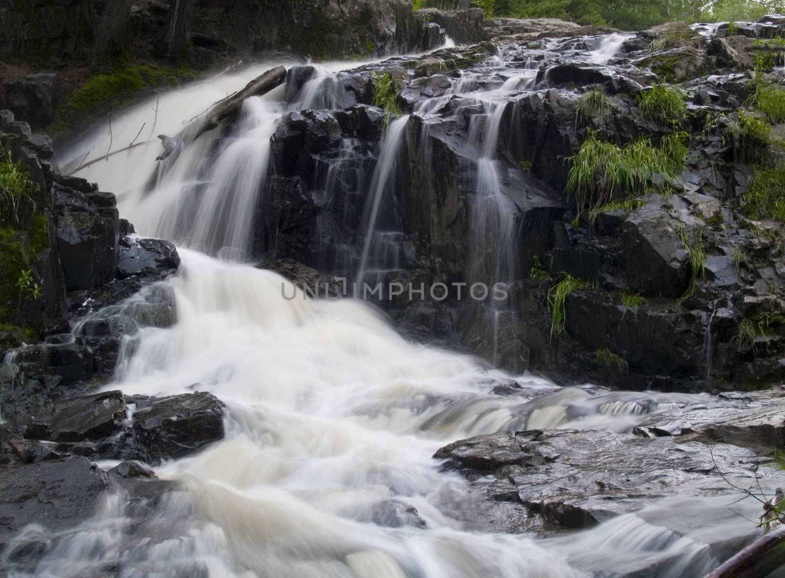 Waterfall Around Stone by CalamityJohn