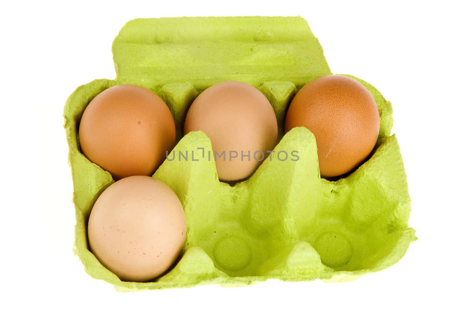 four eggs in a green box