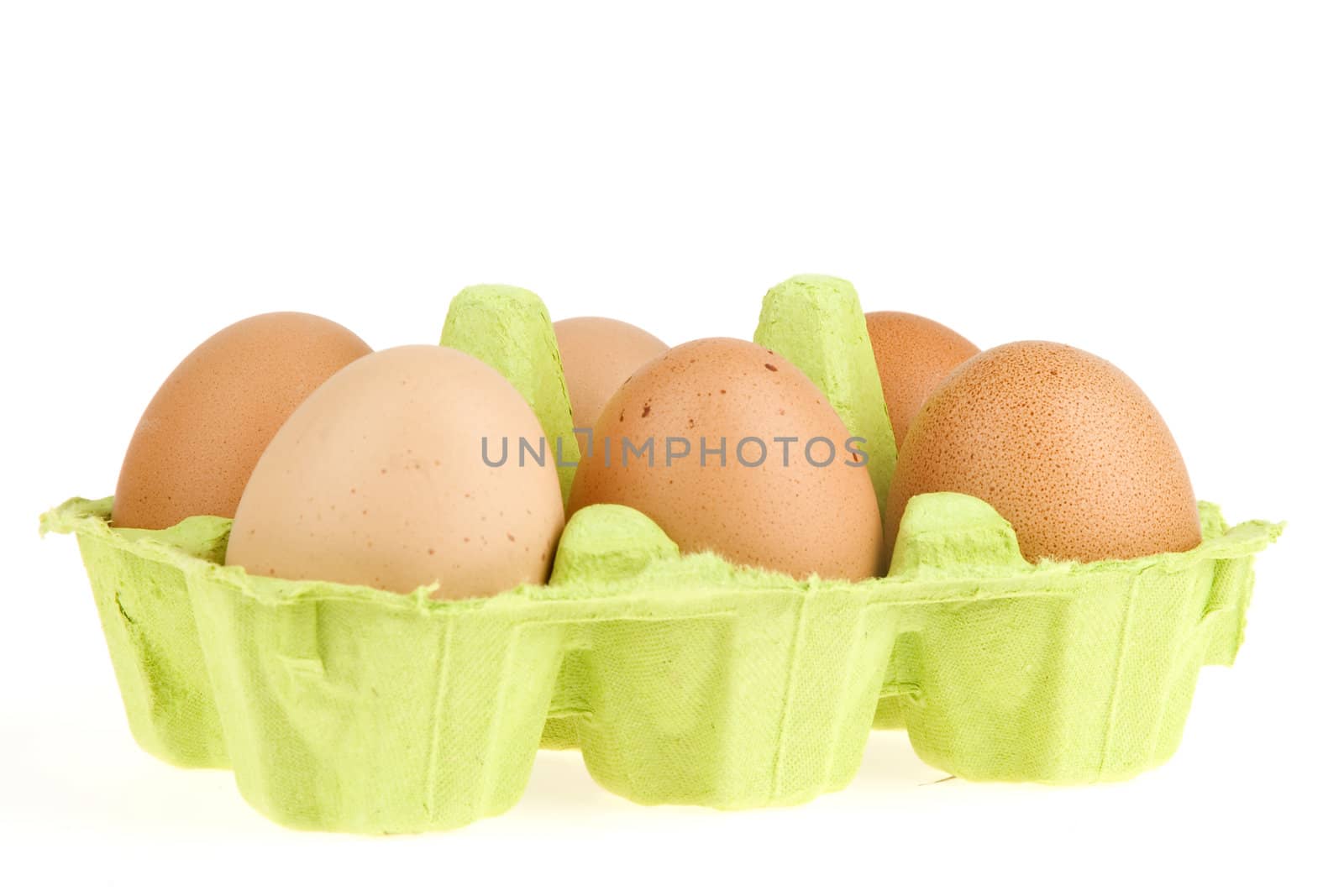 six eggs in a green box