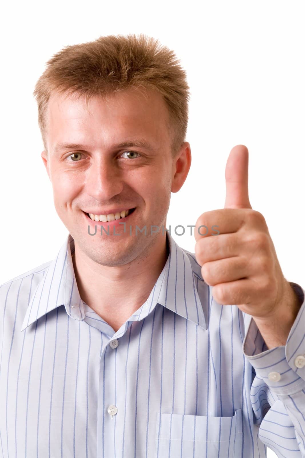 smiling young man with thumbs up on a white background