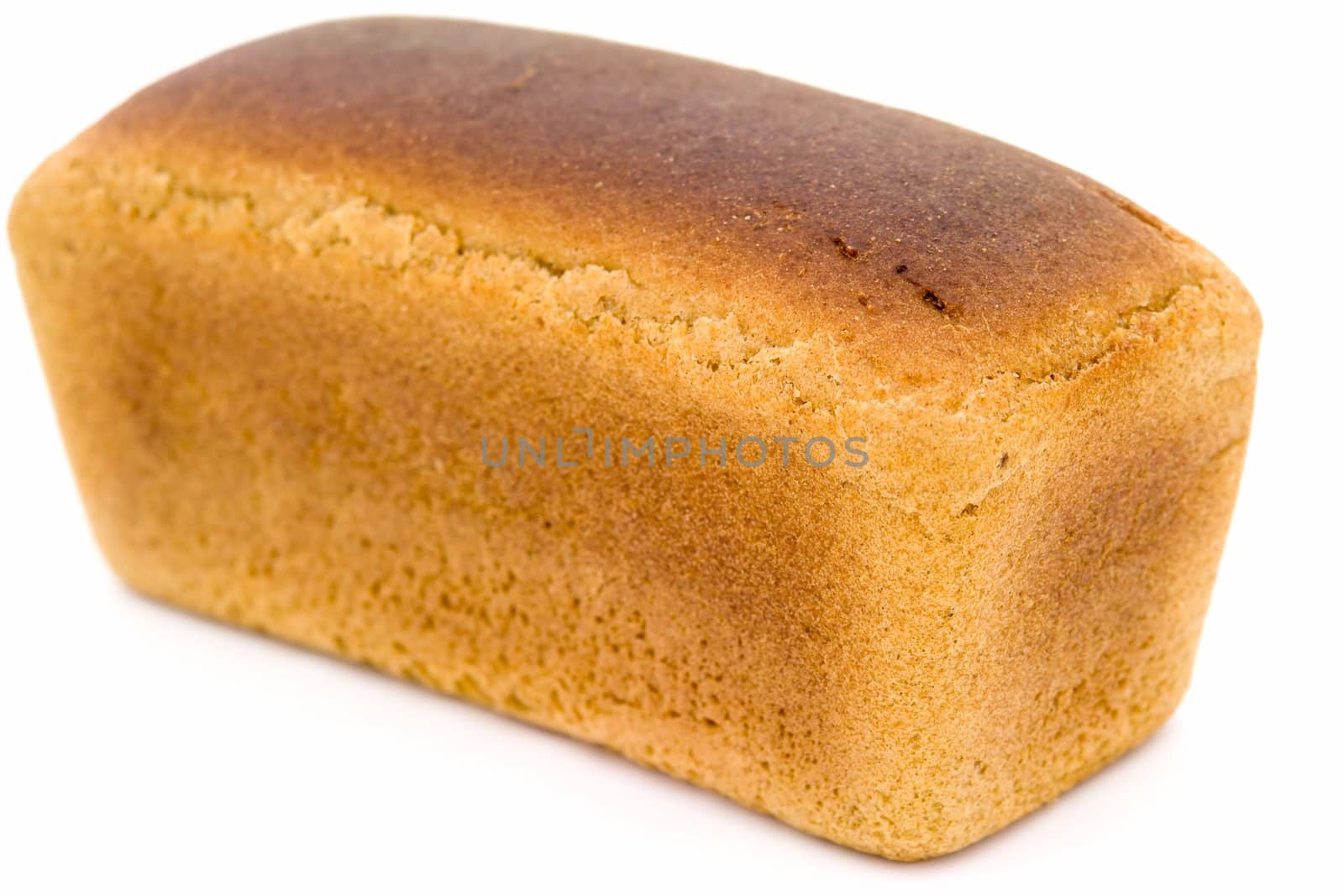 black bread loaf on a white background.