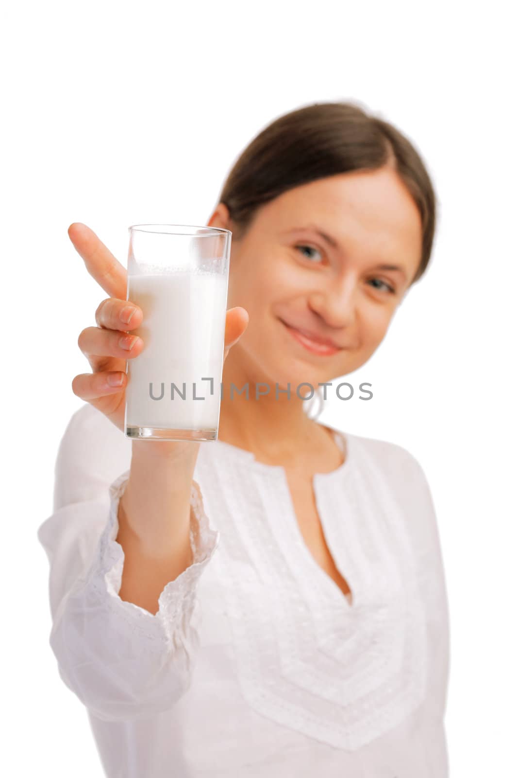 Beautiful woman holding glass of milk by romanshyshak