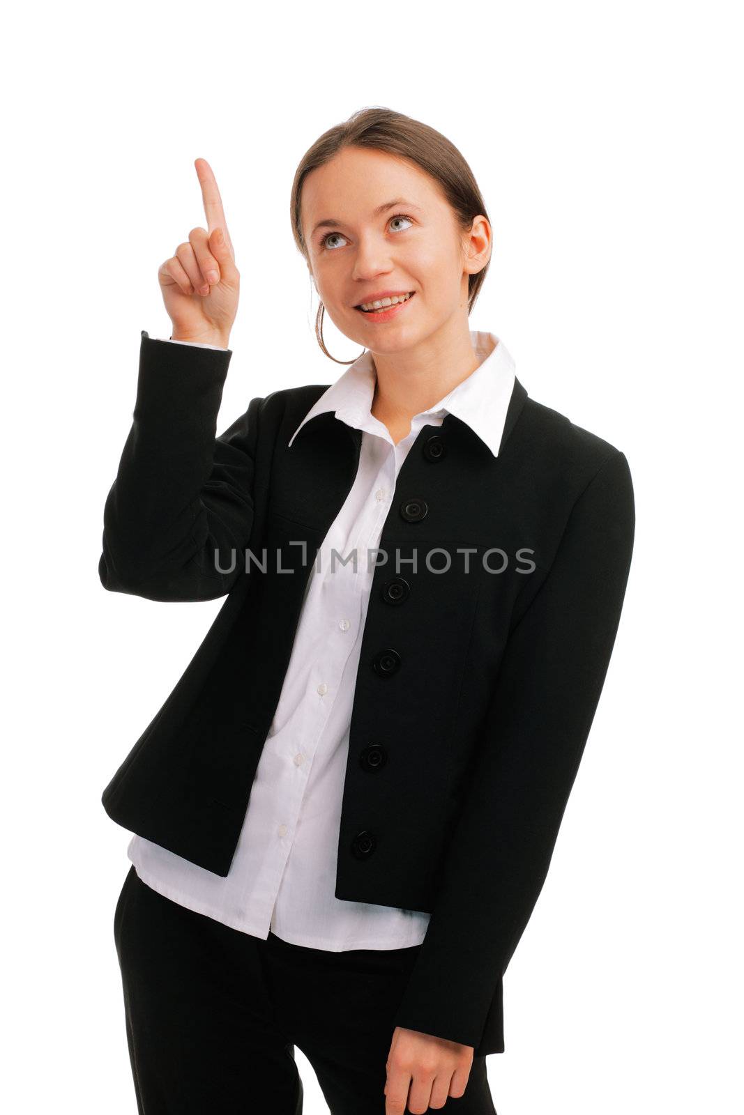 Portrait of a smiling young business woman pointing up at copyspace 