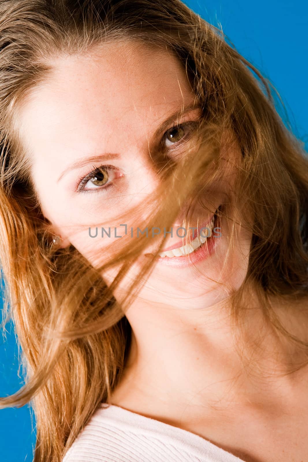 Young beauty woman looking into the lens