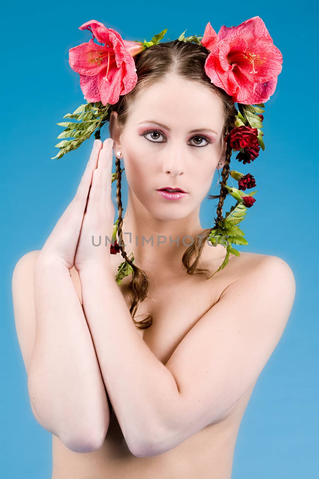 Young woman with big flowers in her hair