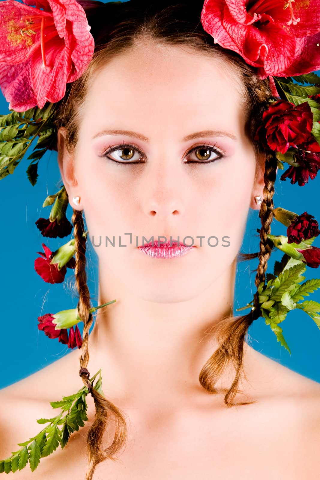 Young woman with big flowers in her hair