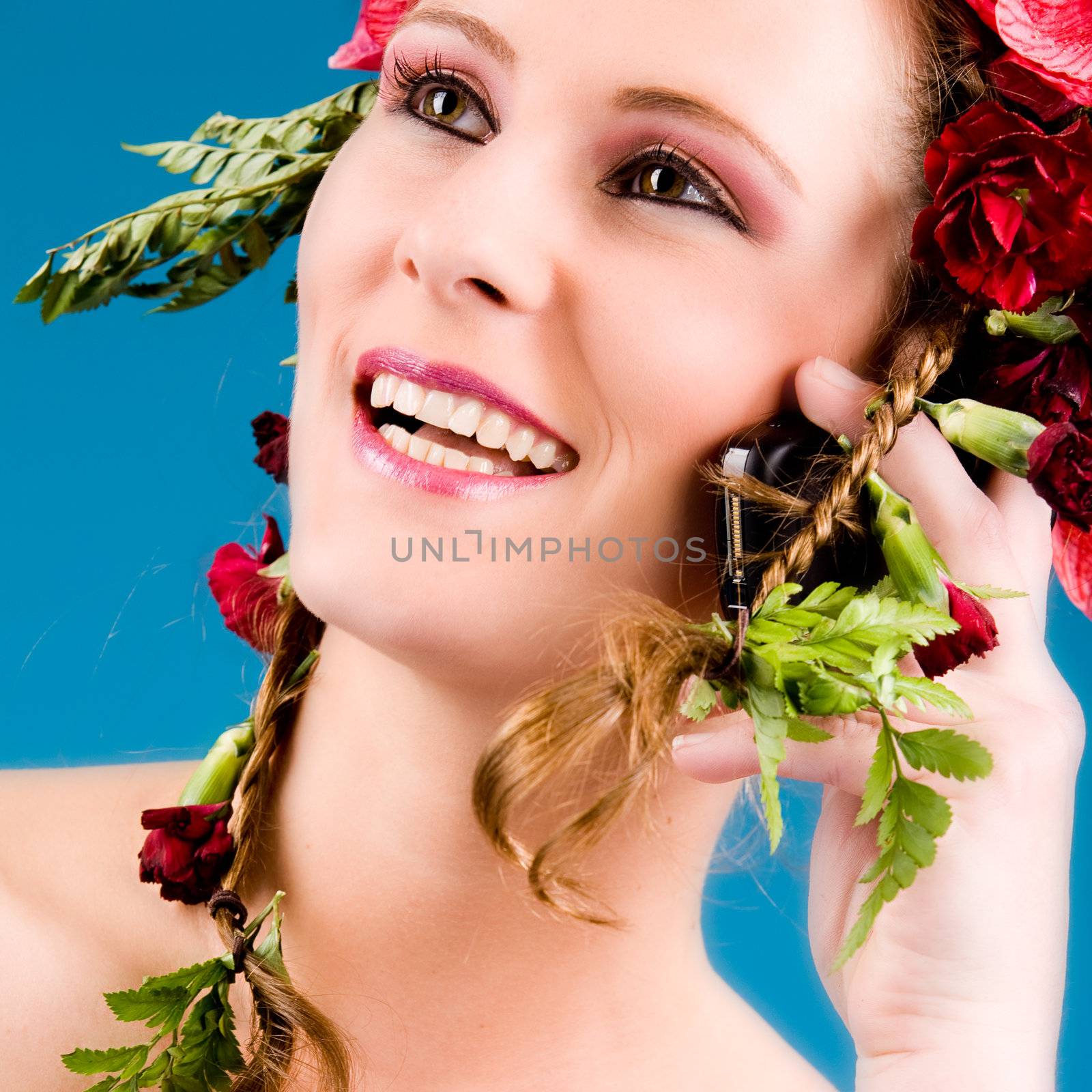 Young woman with big flowers in her hair