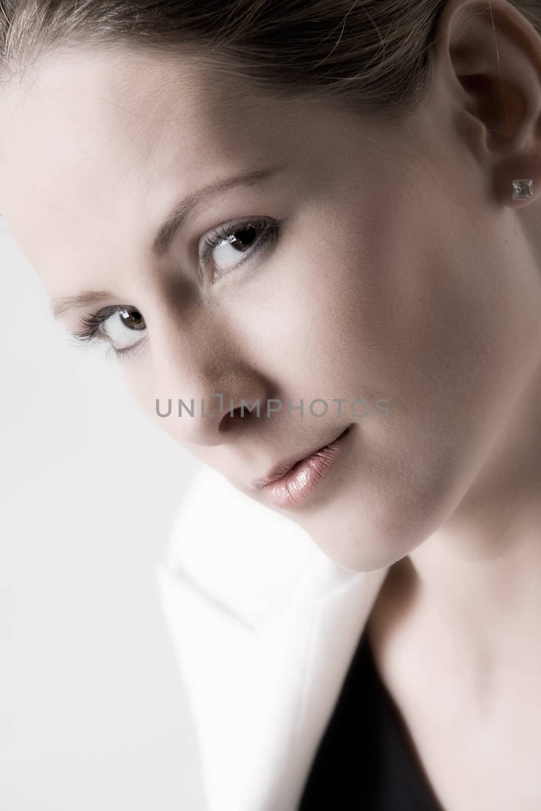 Young beauty woman looking into the lens
