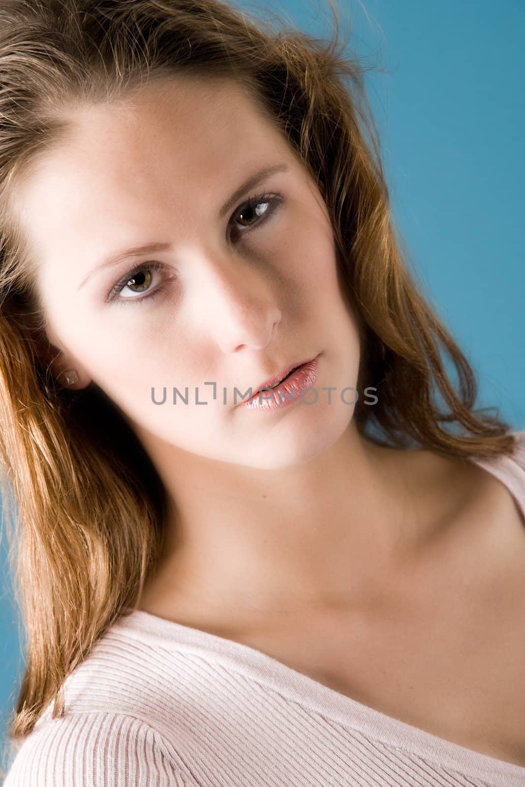 Young beauty woman looking into the lens
