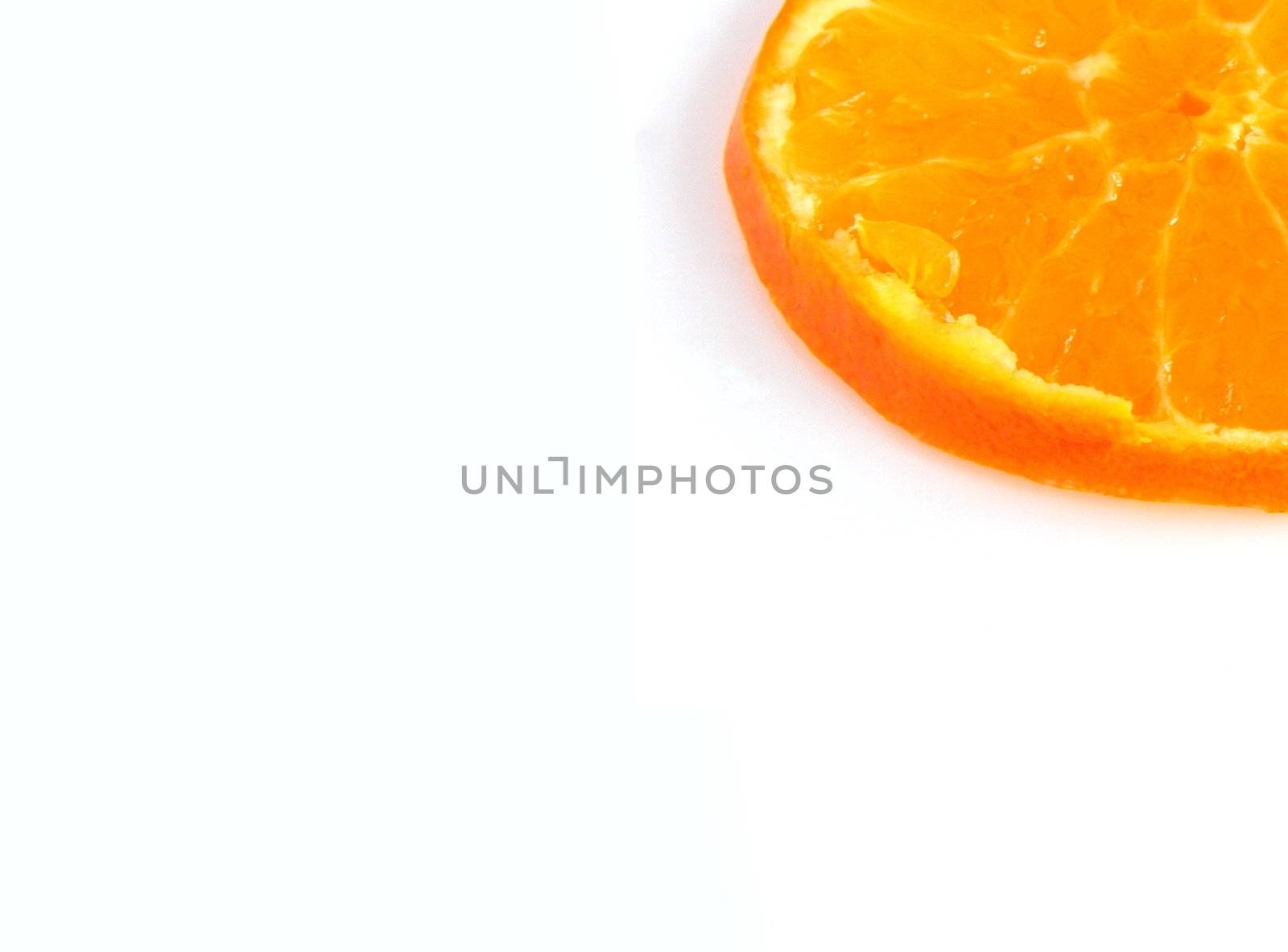 sliced orange by leafy
