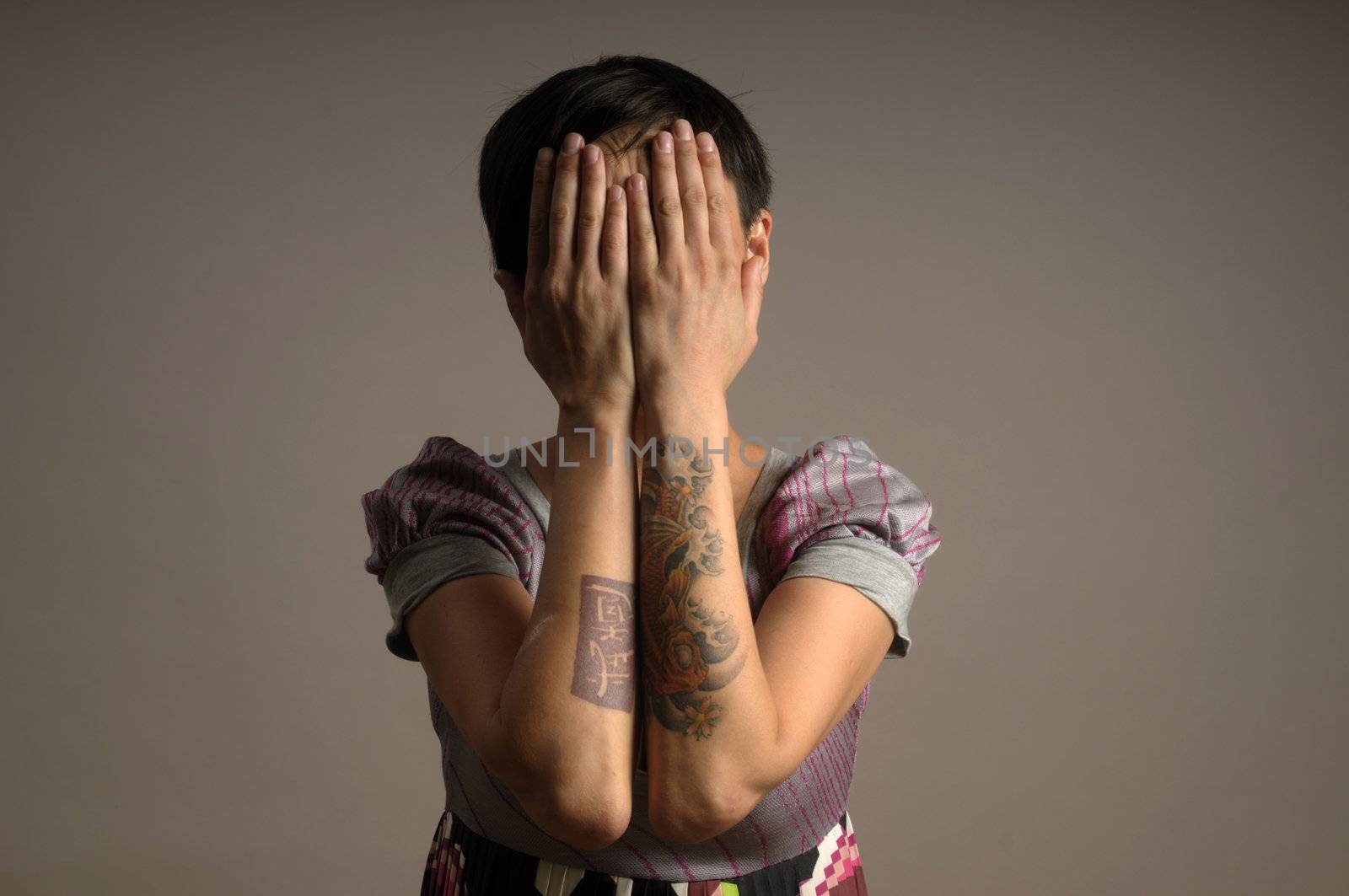Woman with tattoo on arms by Mimal