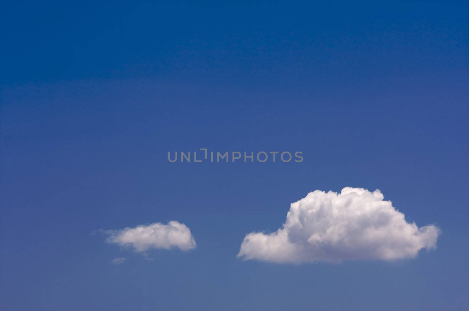 Puffy Clouds on a blue sky.