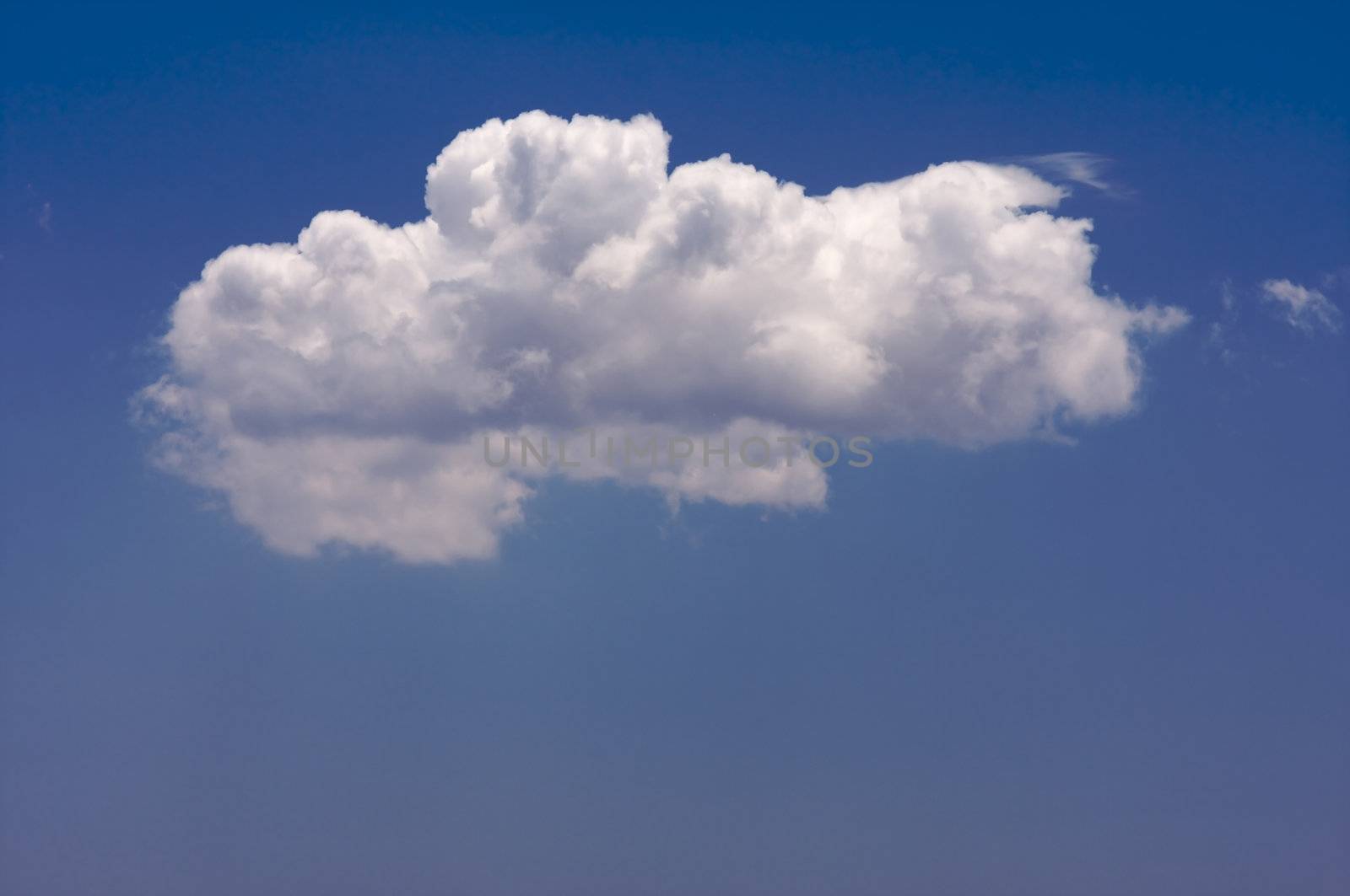 Puffy Clouds on a blue sky.